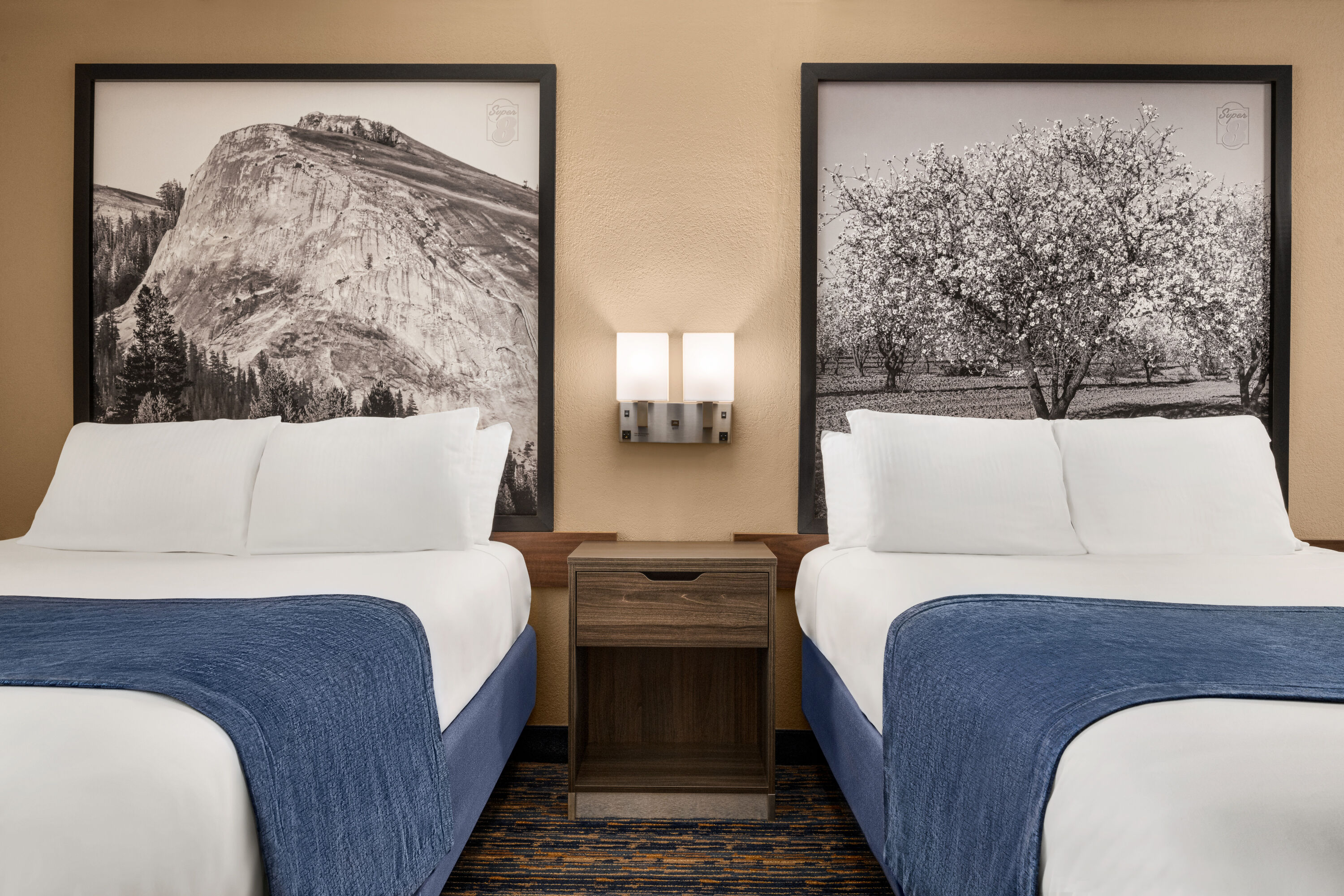 Guest room at the Super 8 by Wyndham Lindsay Olive Tree in Lindsay, California