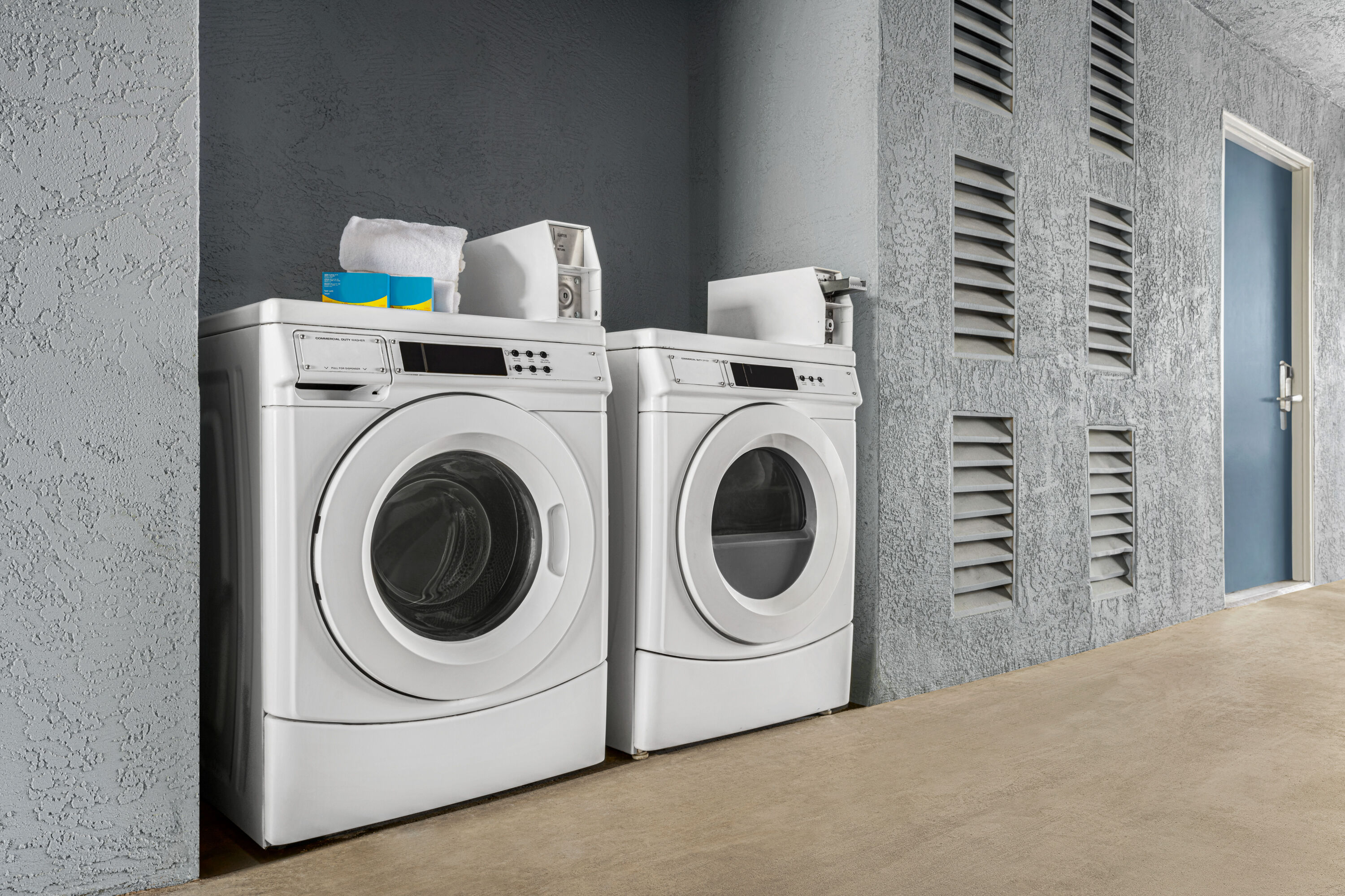 Laundry facilities at Super 8 by Wyndham Lindsay Olive Tree in Lindsay, California