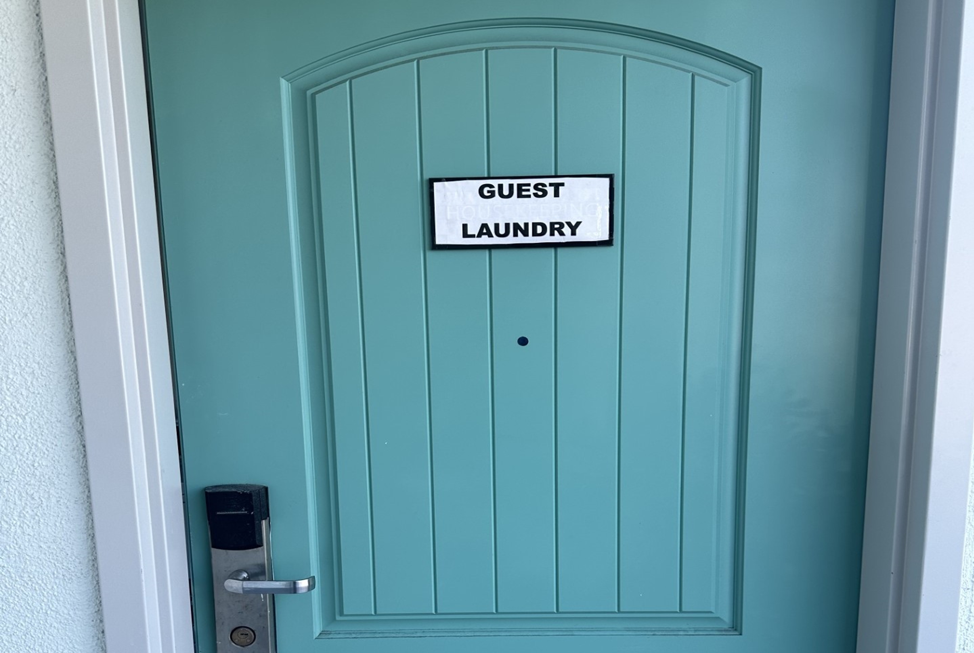 Laundry facilities at Super 8 by Wyndham Oceanside Downtown in Oceanside, California