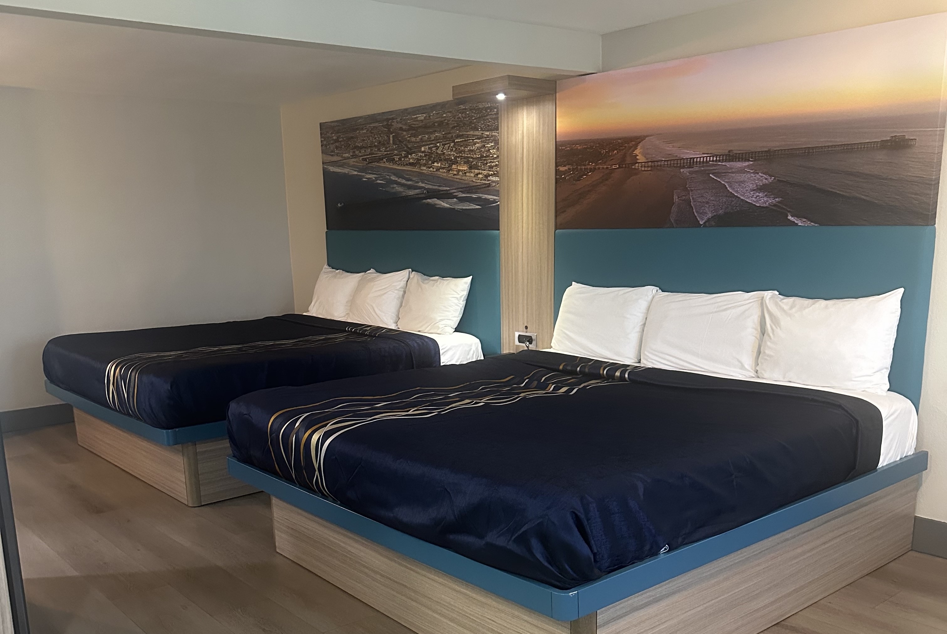 Guest room at the Super 8 by Wyndham Oceanside Downtown in Oceanside, California