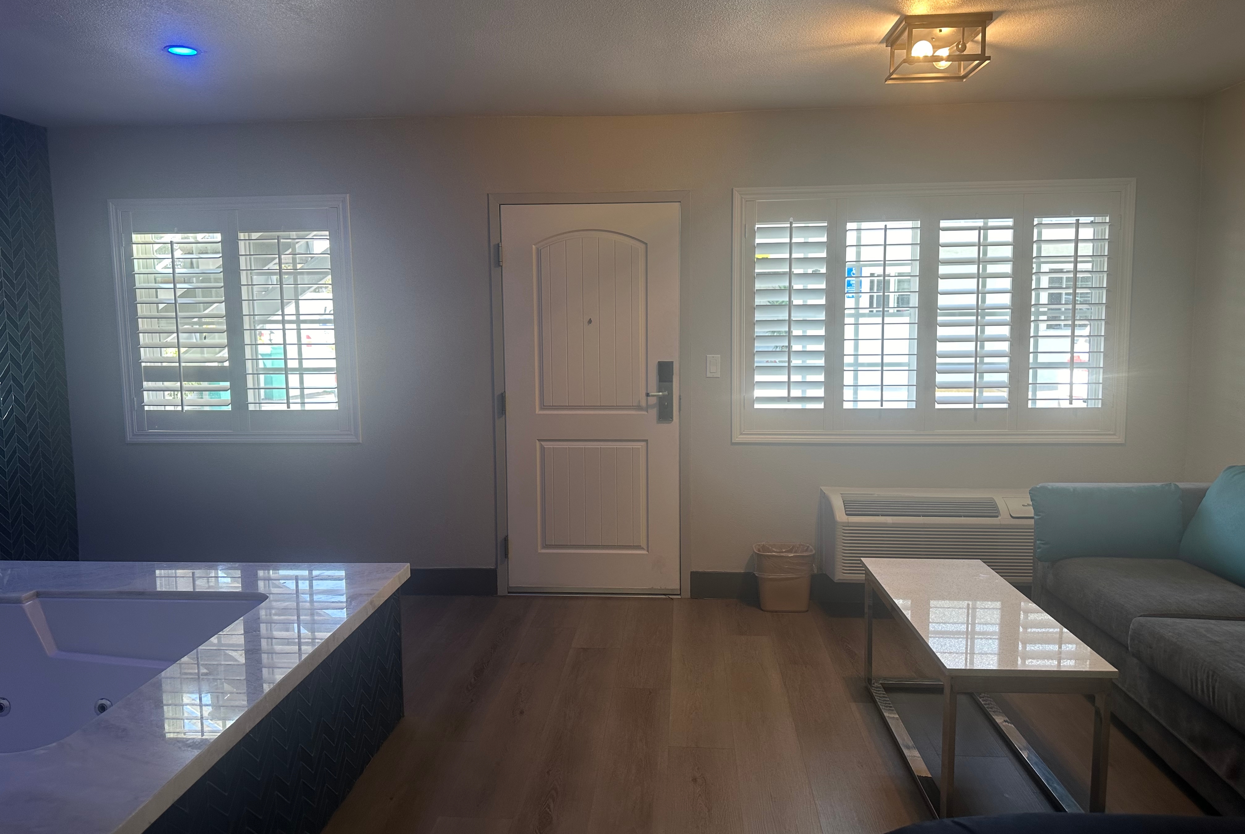 Guest room at the Super 8 by Wyndham Oceanside Downtown in Oceanside, California