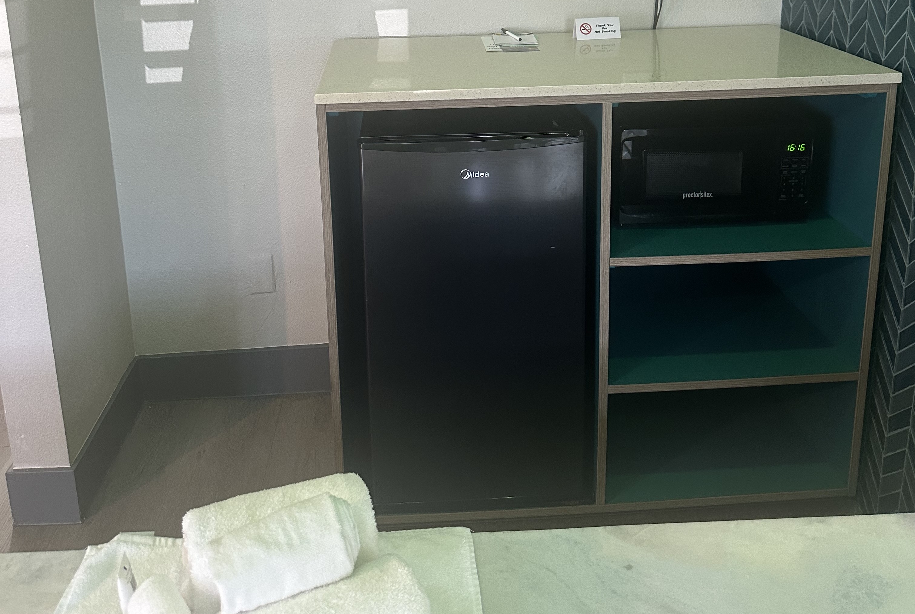 Guest room at the Super 8 by Wyndham Oceanside Downtown in Oceanside, California