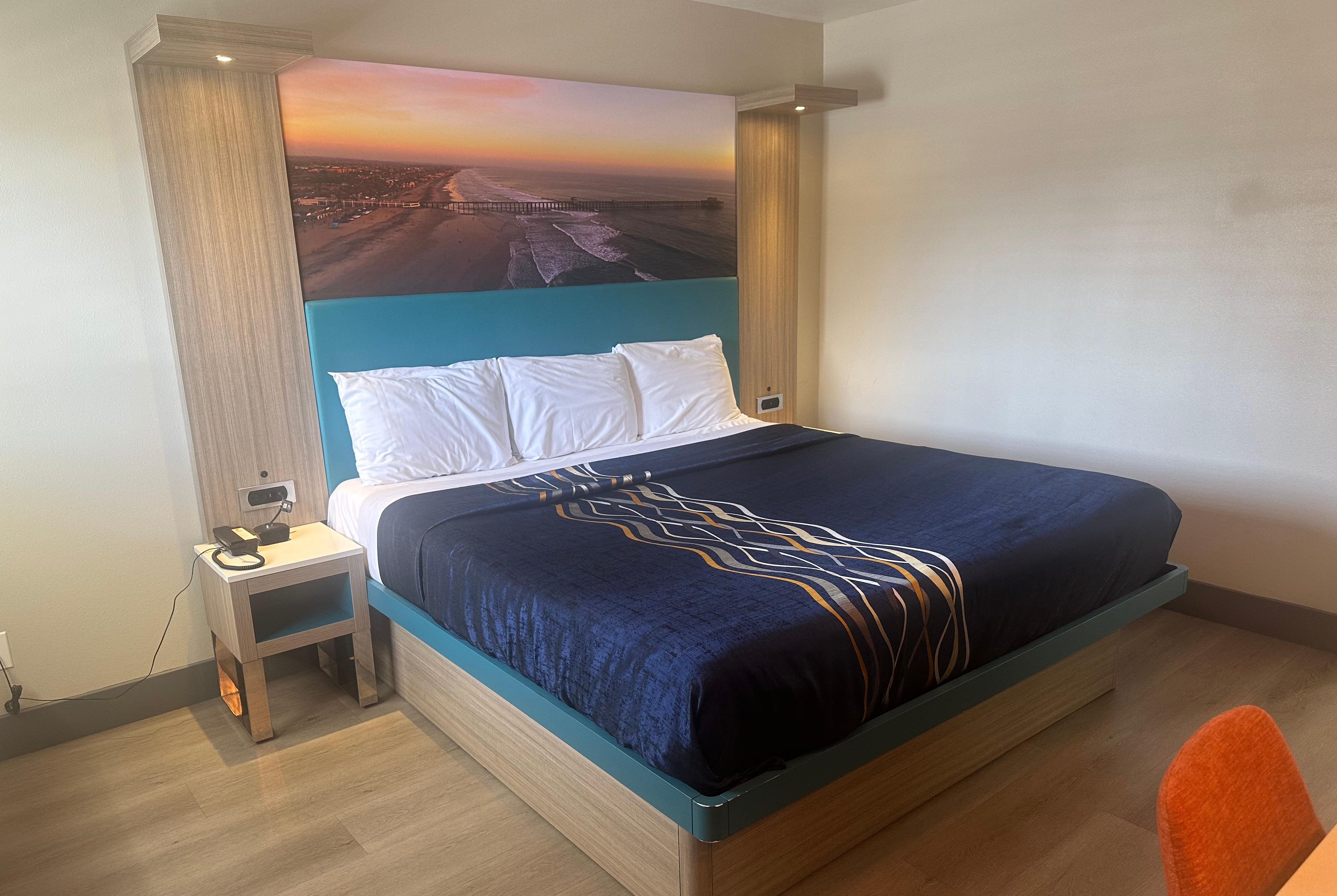 Guest room at the Super 8 by Wyndham Oceanside Downtown in Oceanside, California