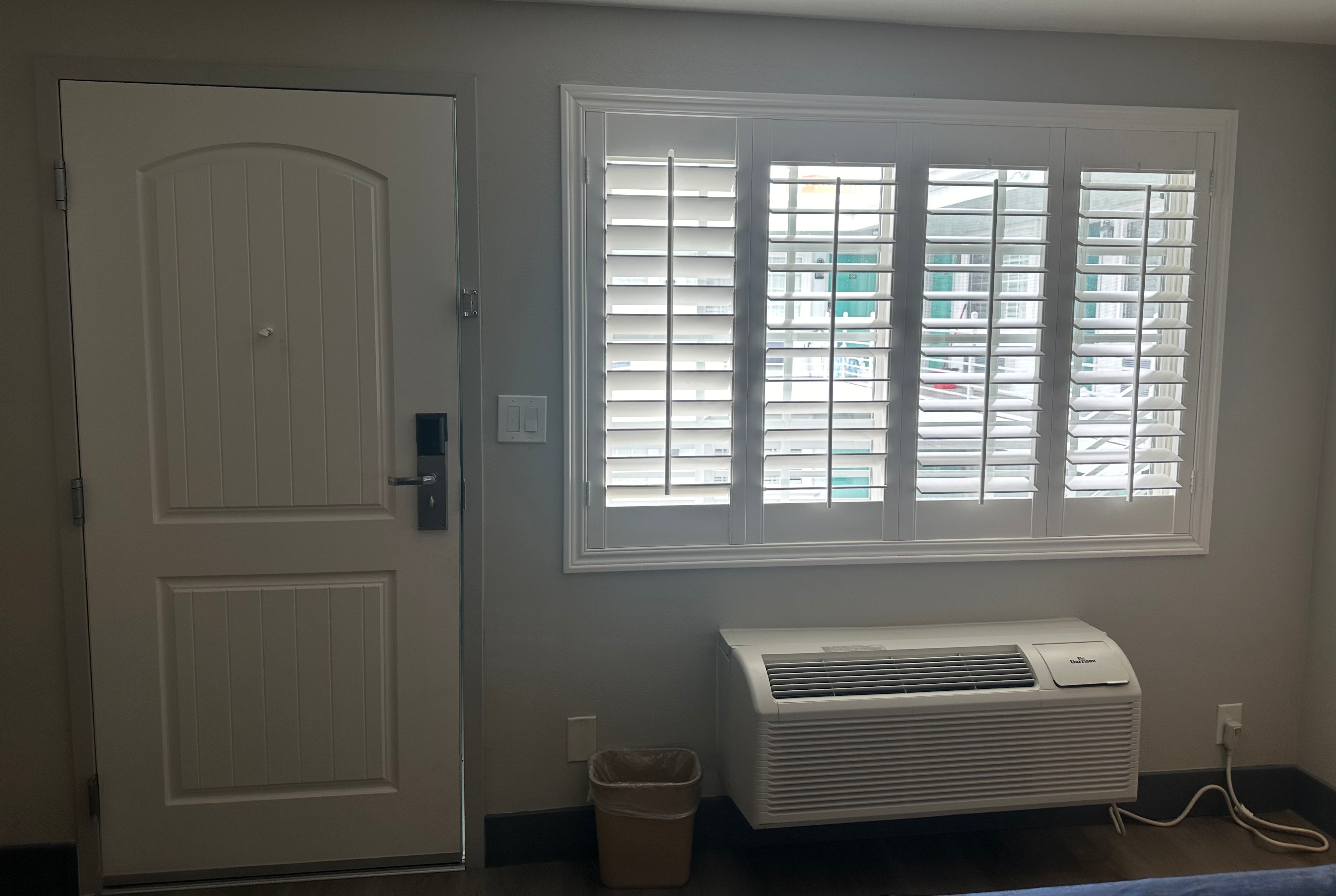 Guest room at the Super 8 by Wyndham Oceanside Downtown in Oceanside, California