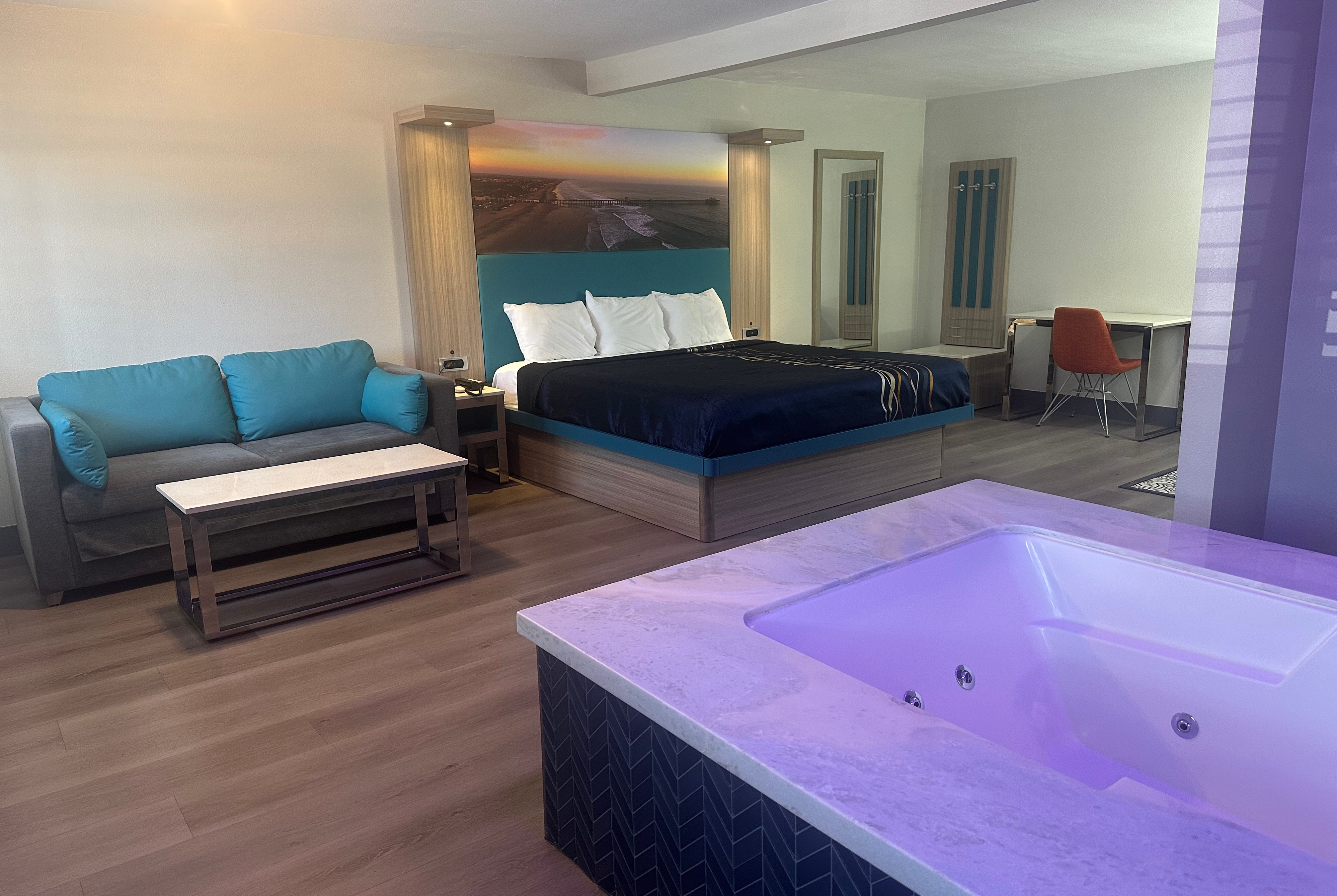 Guest room at the Super 8 by Wyndham Oceanside Downtown in Oceanside, California