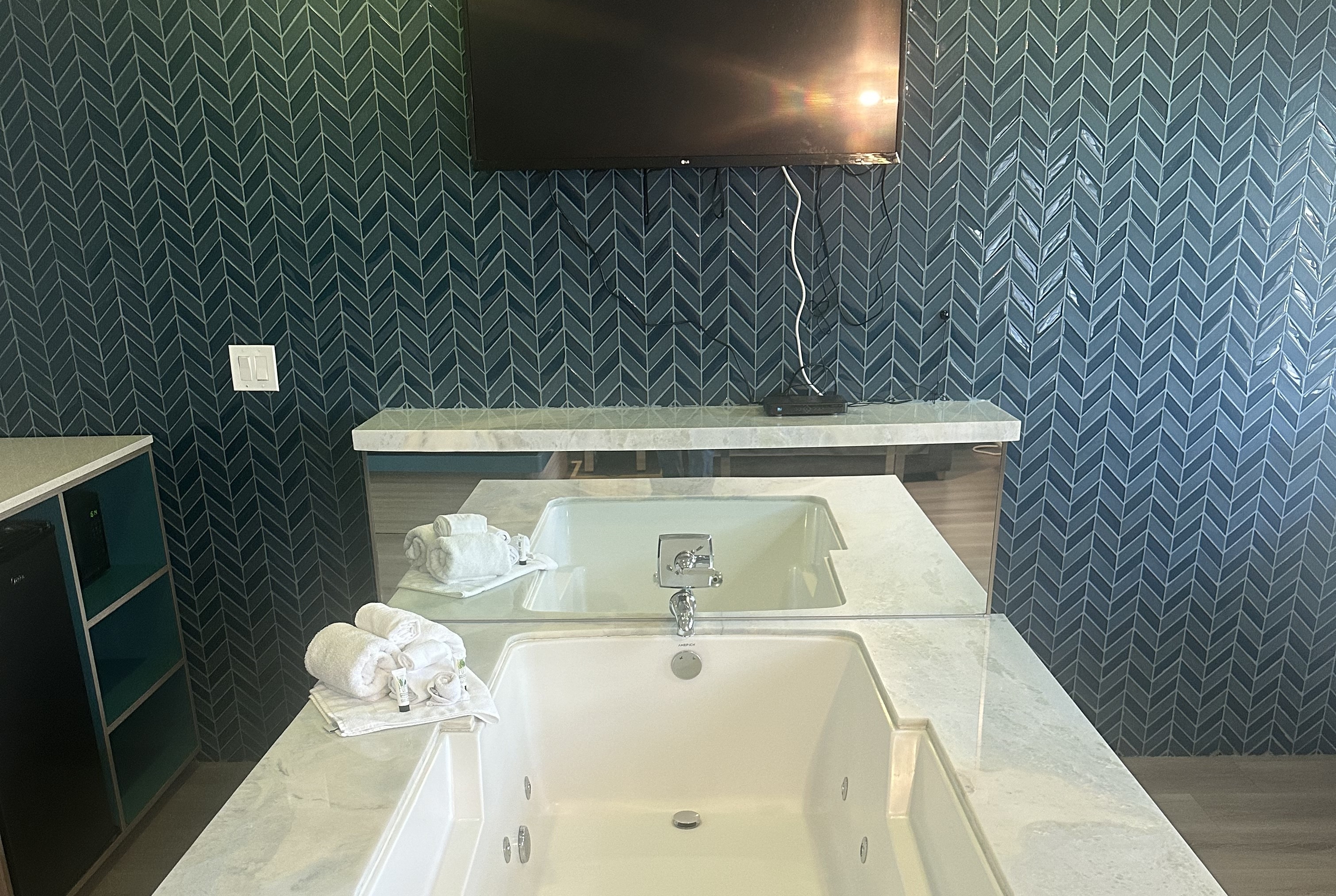 Guest room at the Super 8 by Wyndham Oceanside Downtown in Oceanside, California