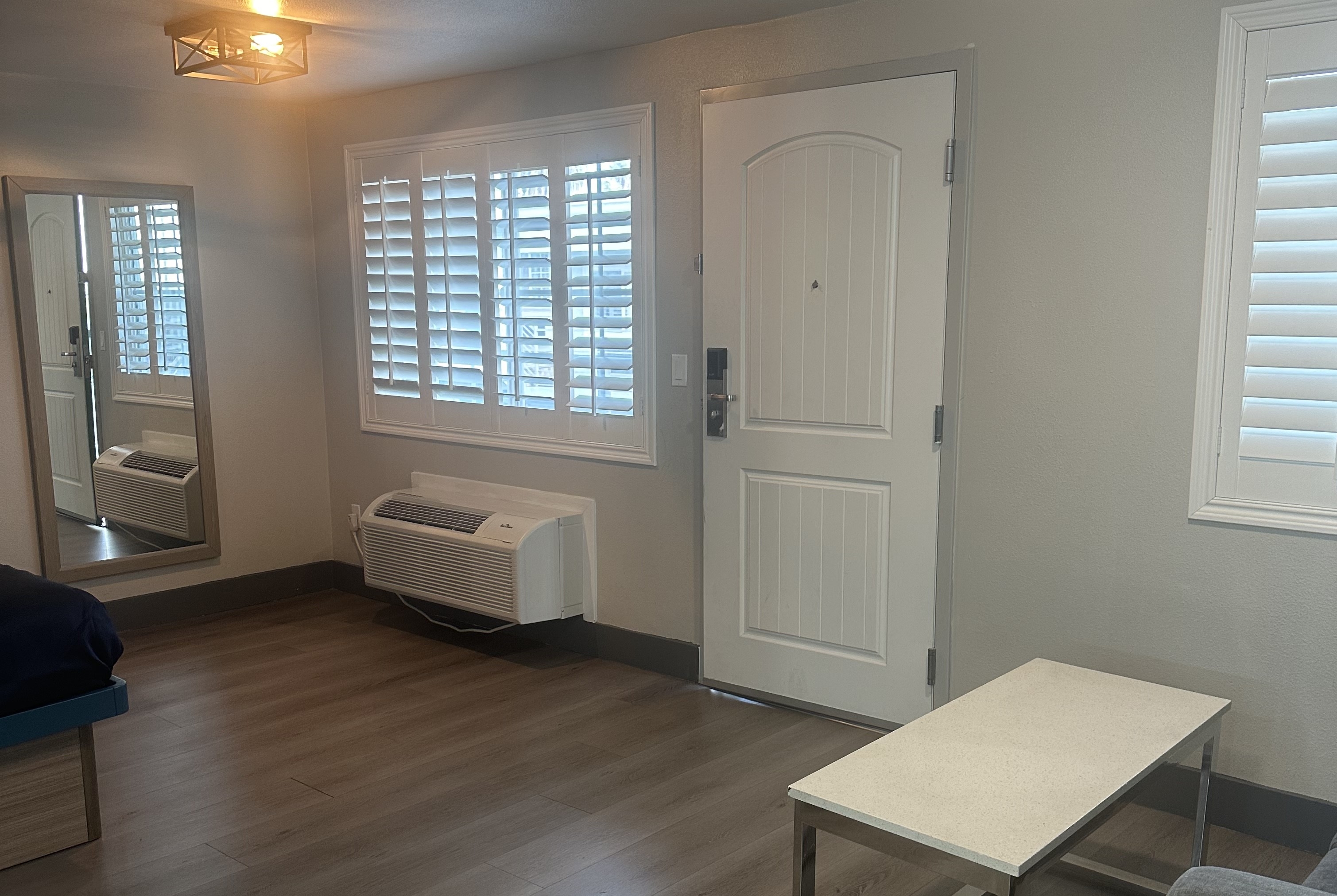 Guest room at the Super 8 by Wyndham Oceanside Downtown in Oceanside, California