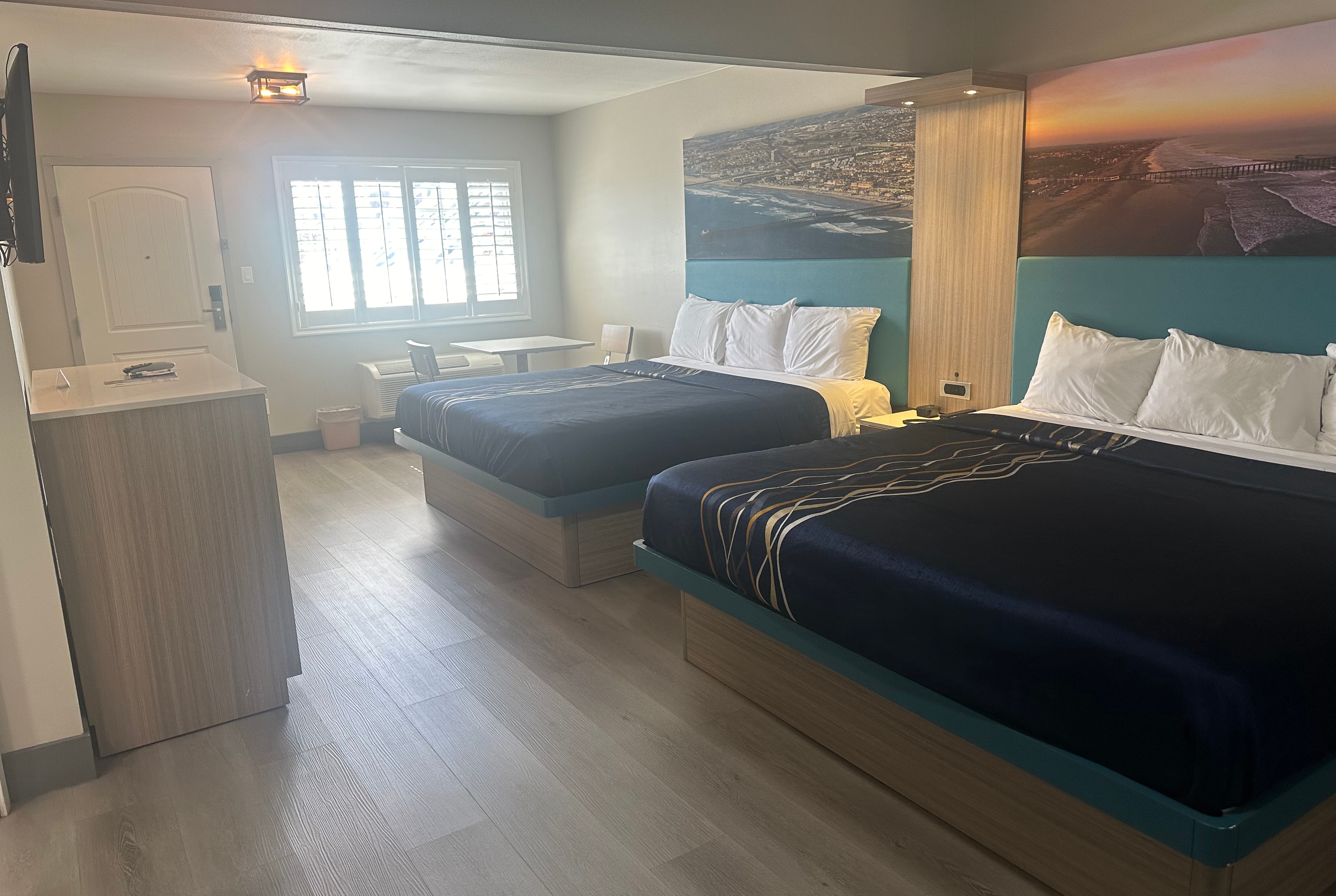 Guest room at the Super 8 by Wyndham Oceanside Downtown in Oceanside, California