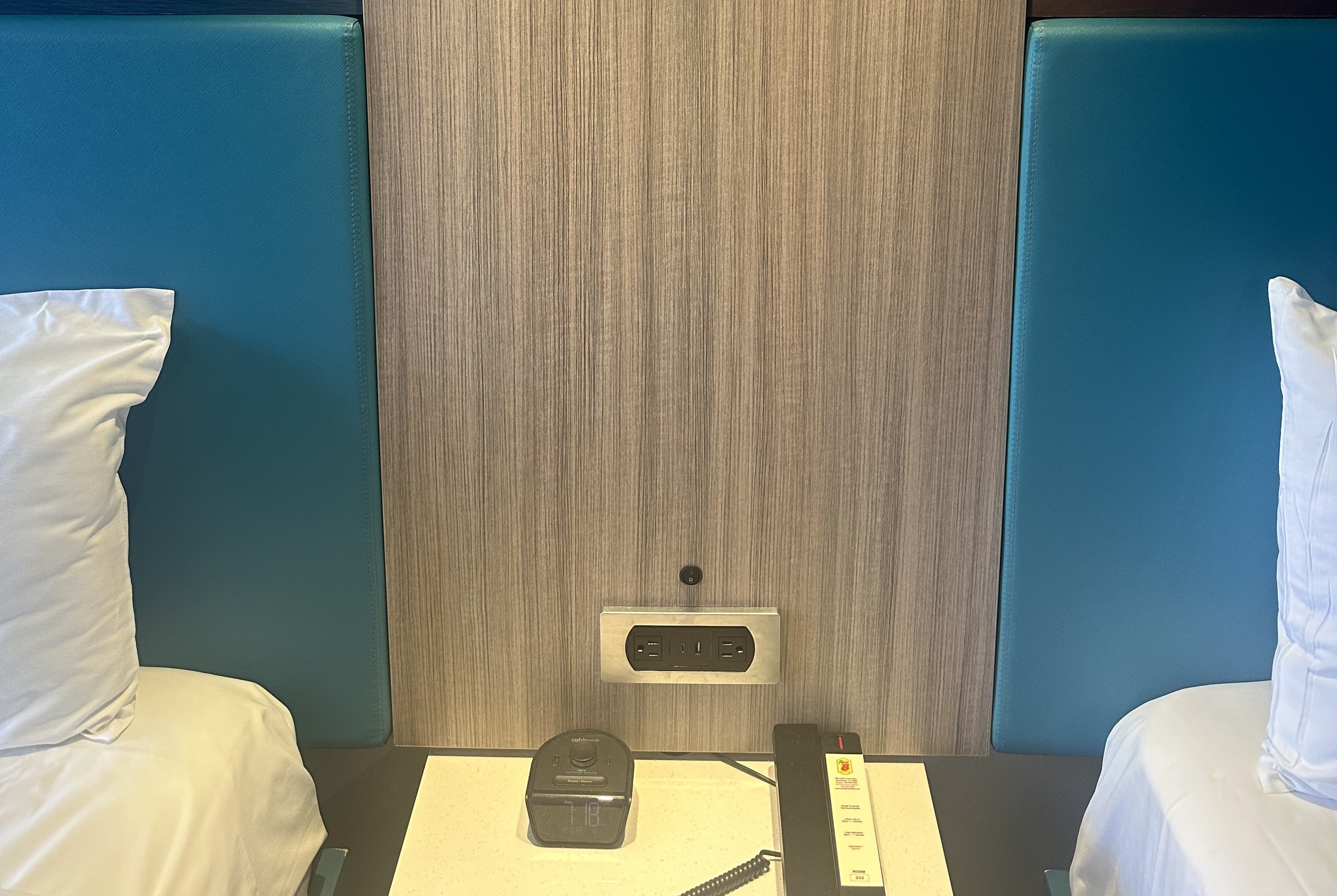 Guest room at the Super 8 by Wyndham Oceanside Downtown in Oceanside, California