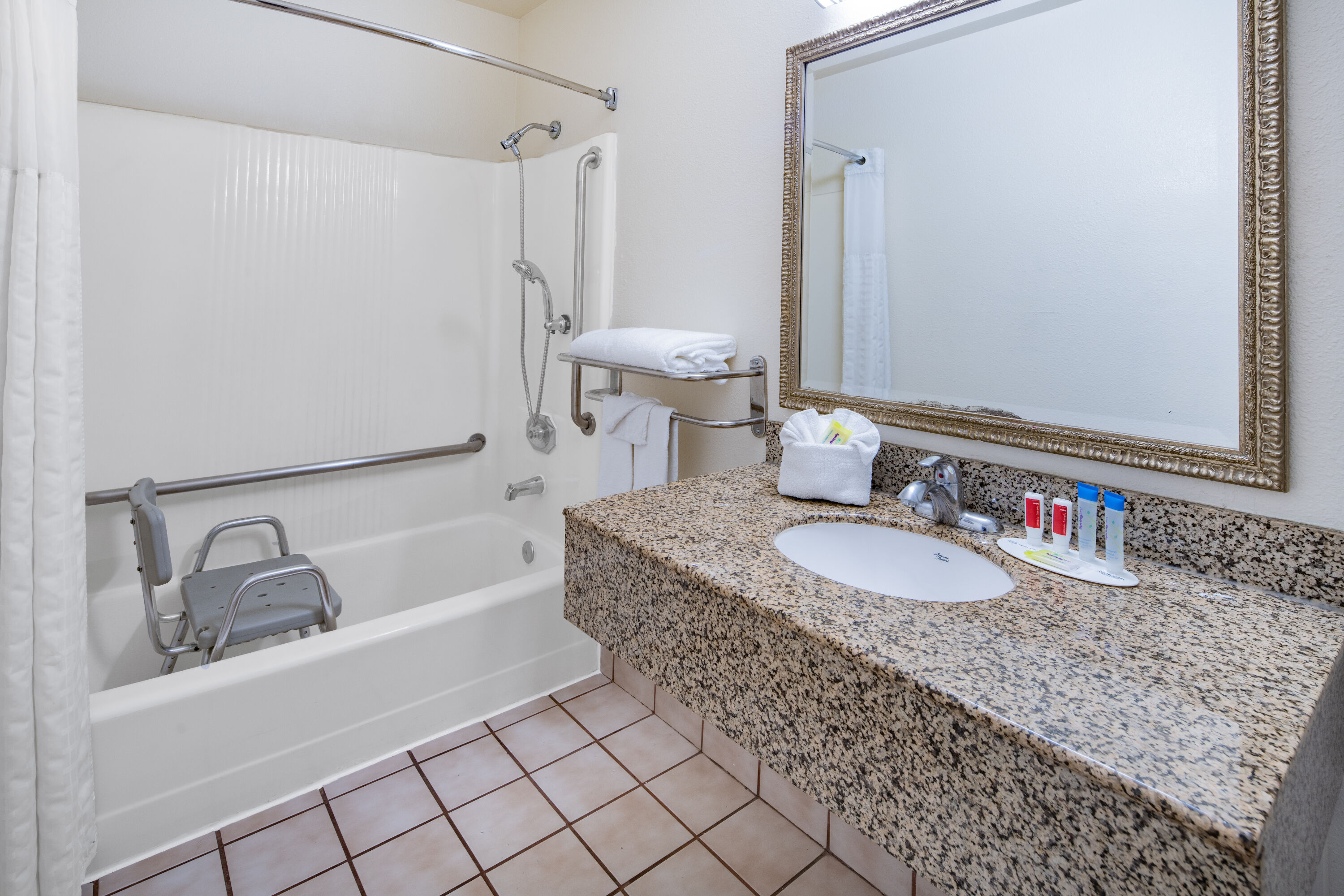 Guest room bath at the Super 8 by Wyndham San Diego Hotel Circle in San Diego, California