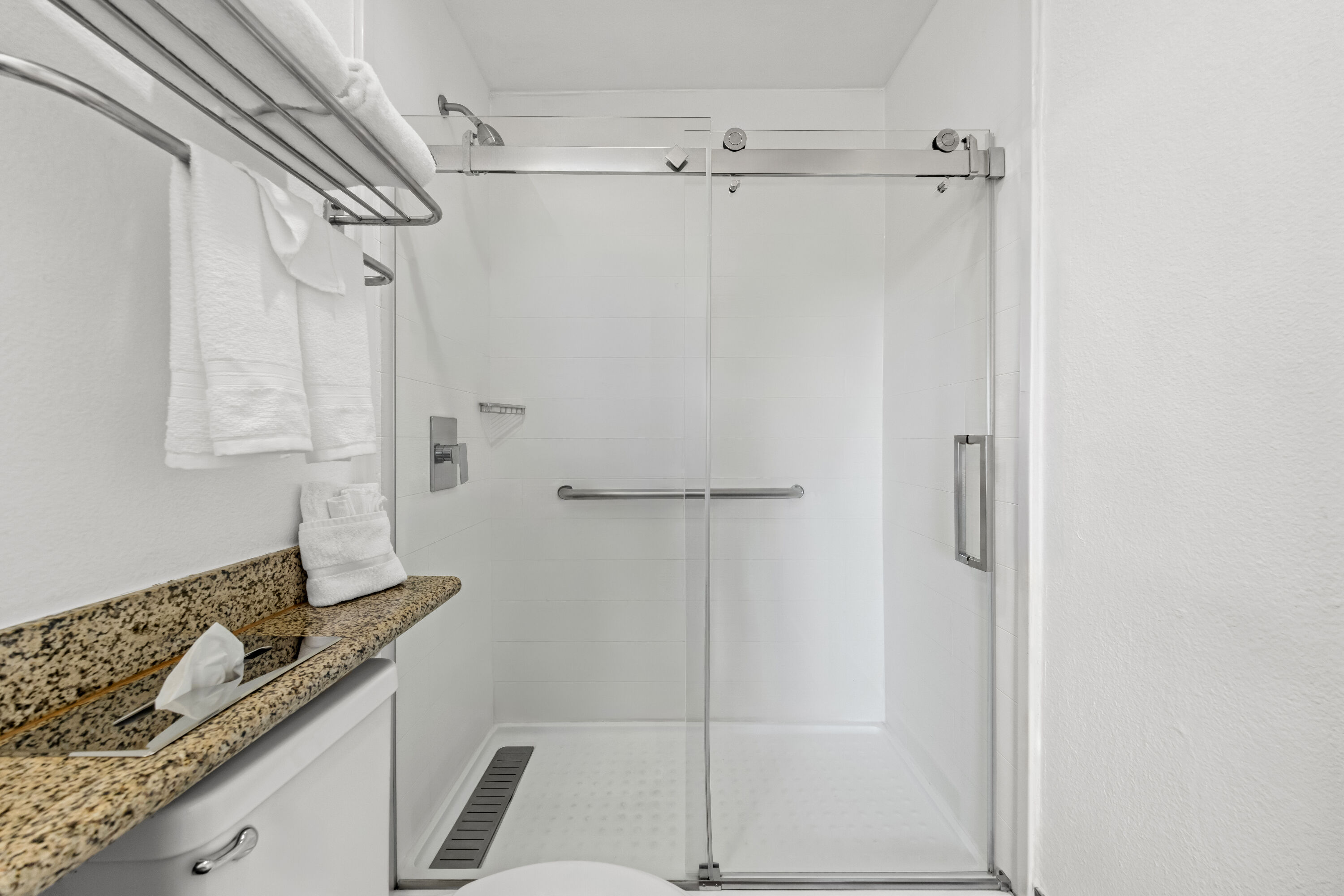 Guest room bath at the Super 8 by Wyndham San Diego Hotel Circle in San Diego, California
