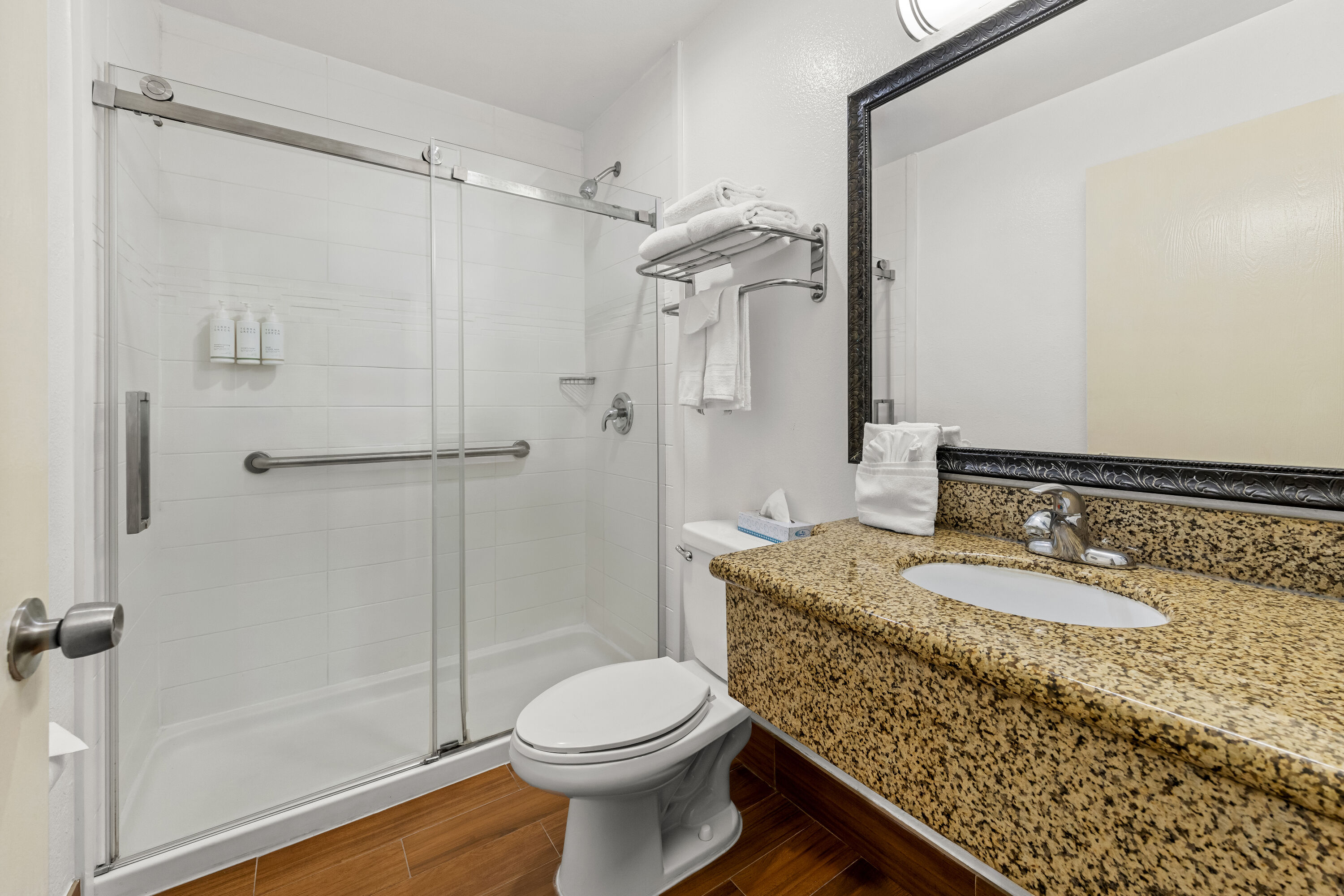 Guest room bath at the Super 8 by Wyndham San Diego Hotel Circle in San Diego, California