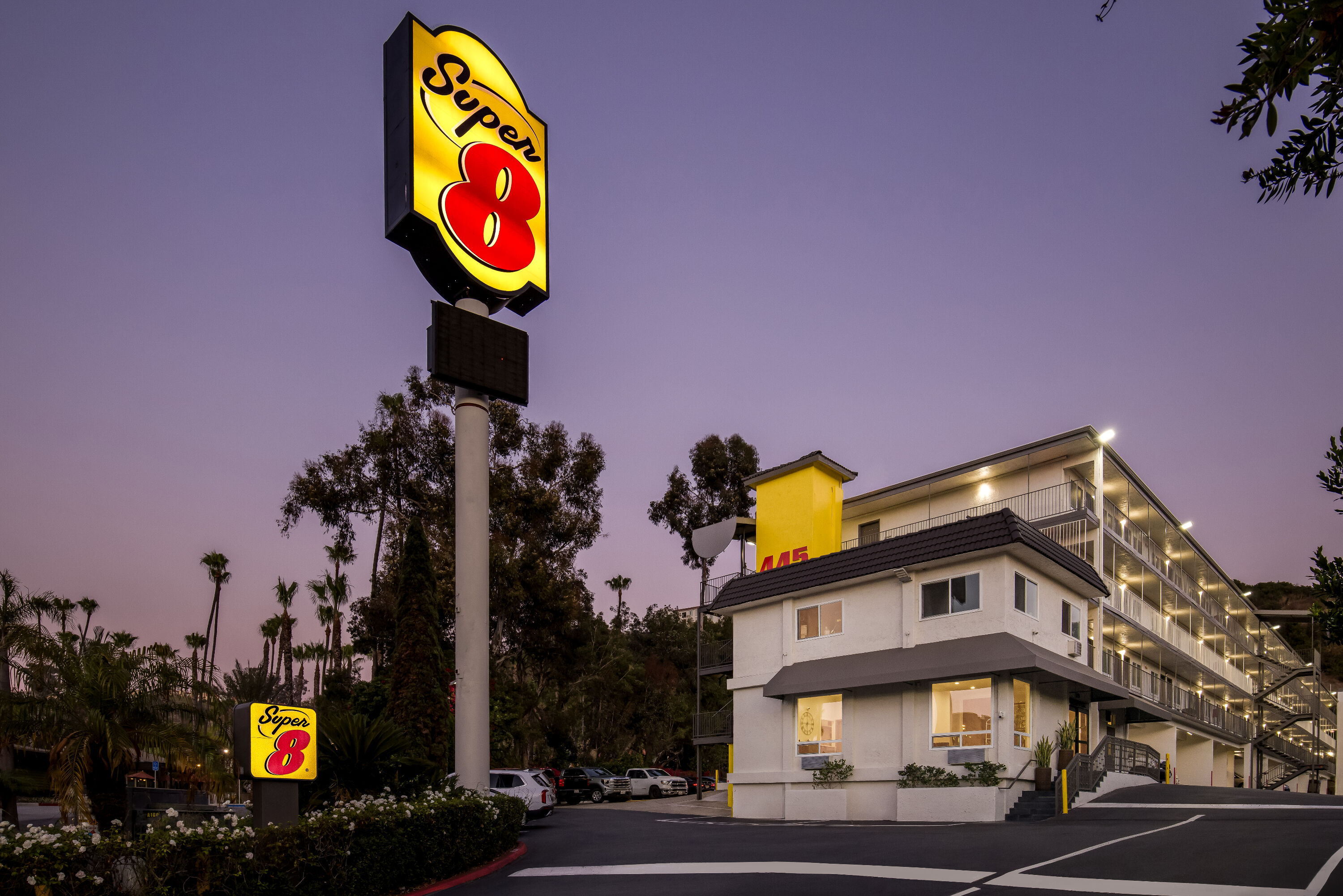 Exterior Night Image of Super 8 by Wyndham San Diego Hotel Circle hotel in San Diego, California