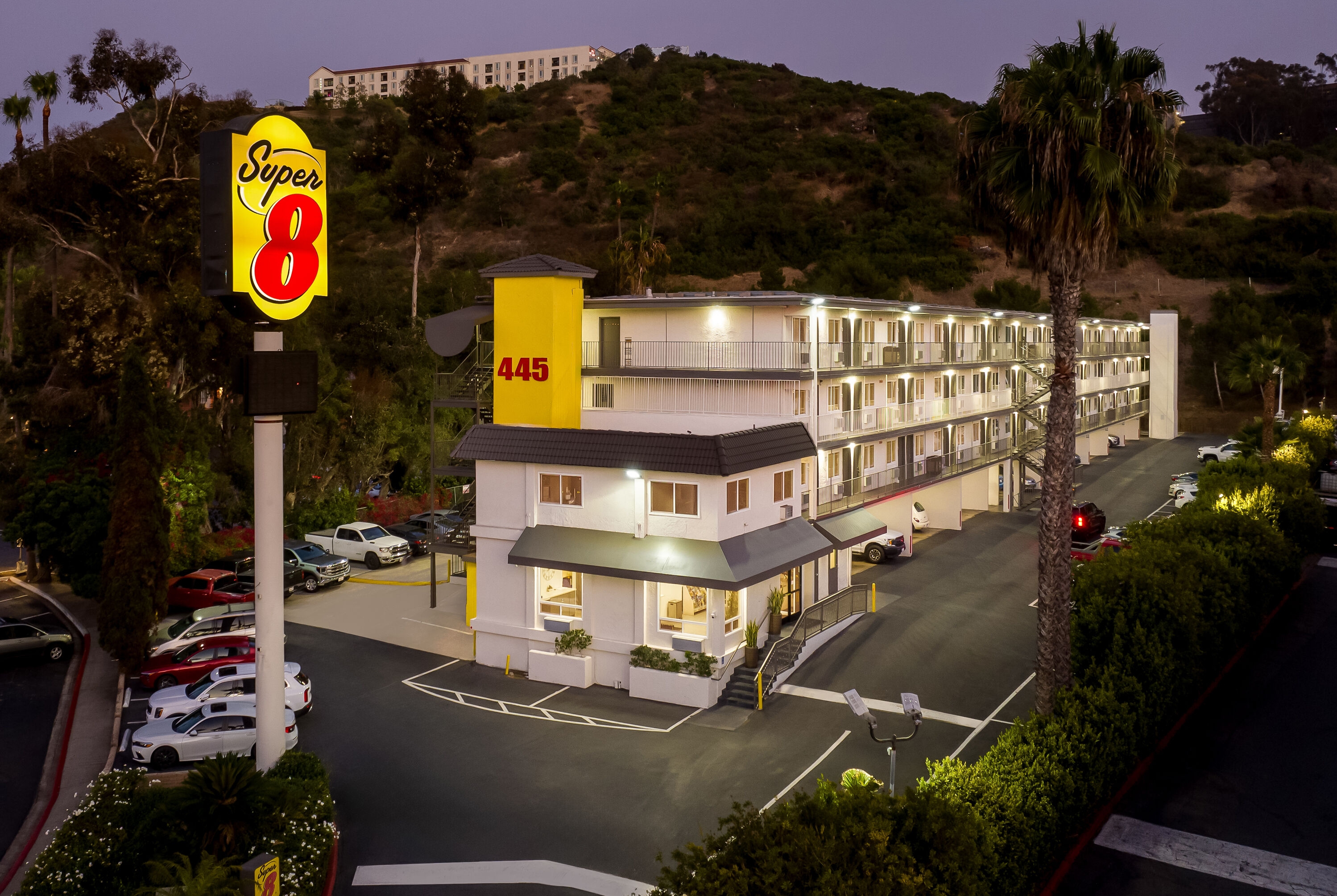 Exterior Night Image of Super 8 by Wyndham San Diego Hotel Circle hotel in San Diego, California