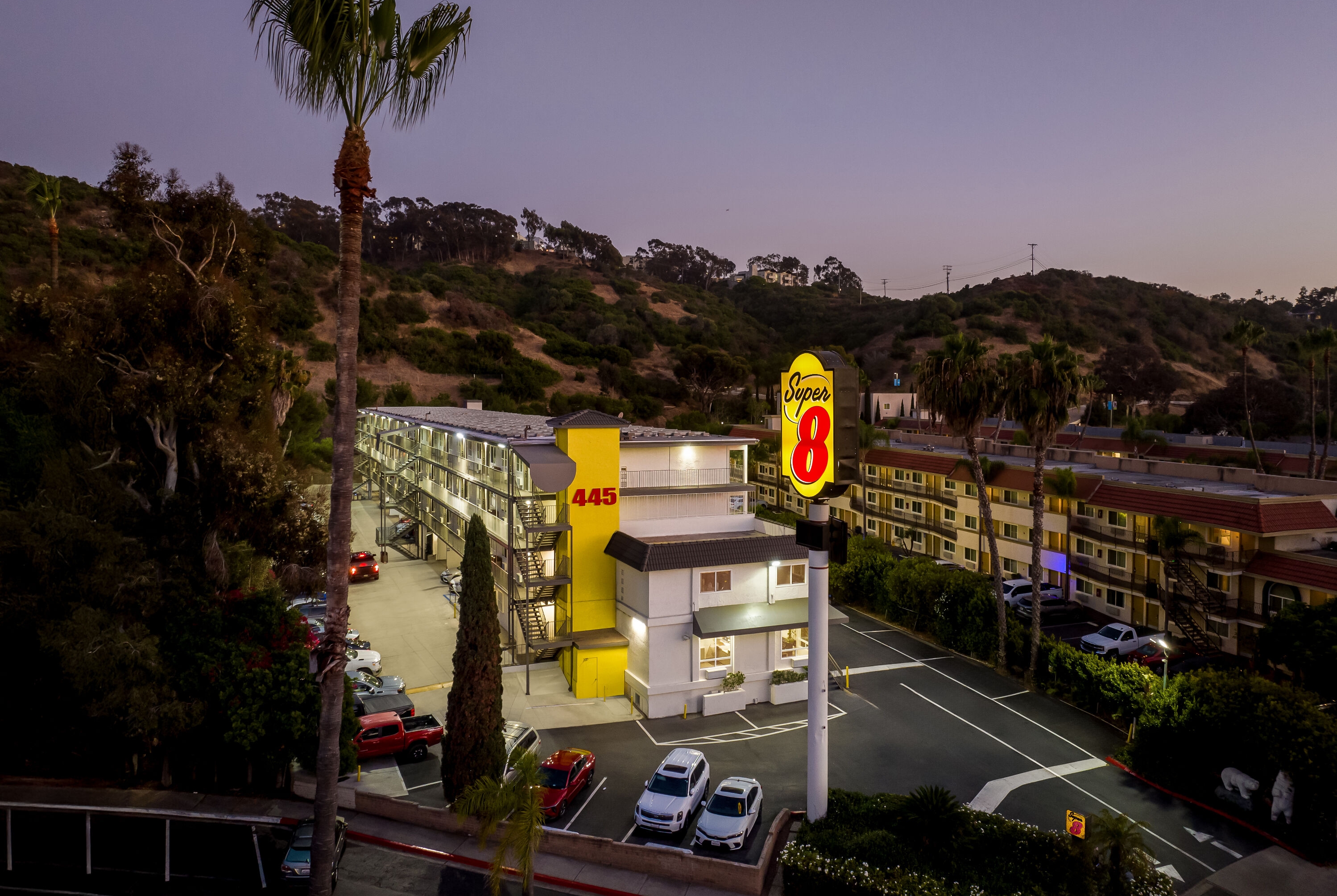 Exterior Night Image of Super 8 by Wyndham San Diego Hotel Circle hotel in San Diego, California