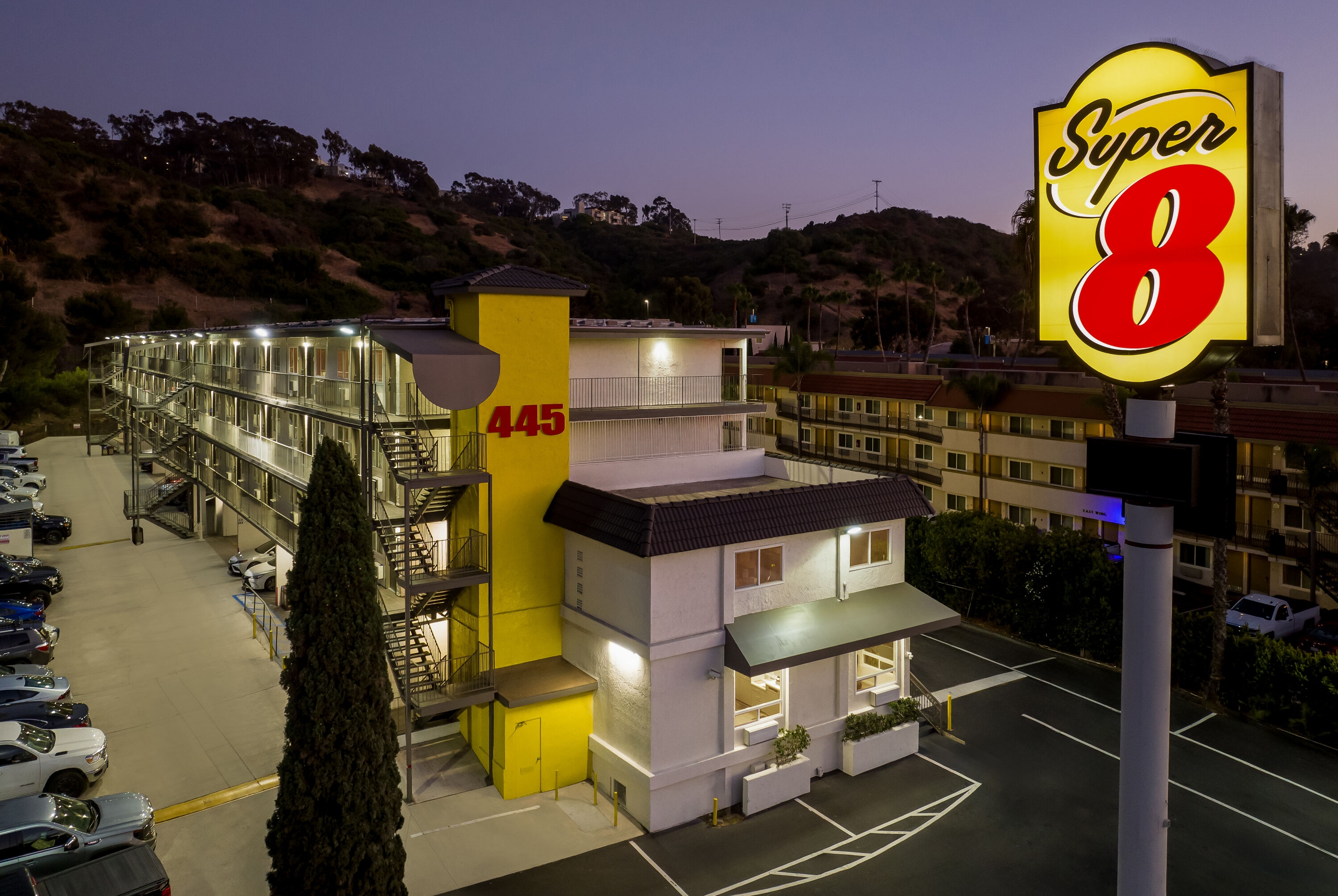 Exterior Night Image of Super 8 by Wyndham San Diego Hotel Circle hotel in San Diego, California