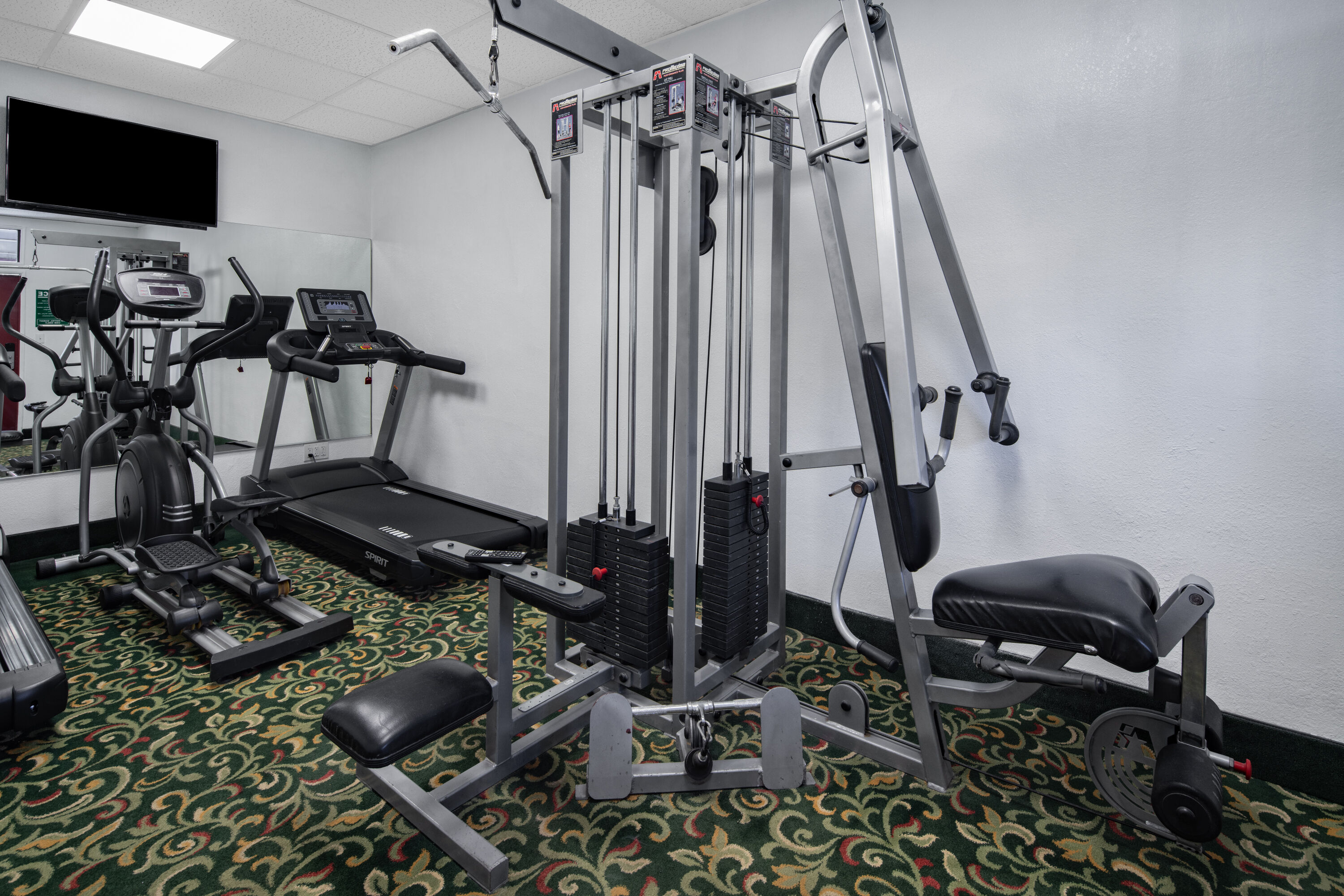 Fitness room at Super 8 by Wyndham San Diego Hotel Circle in San Diego, California