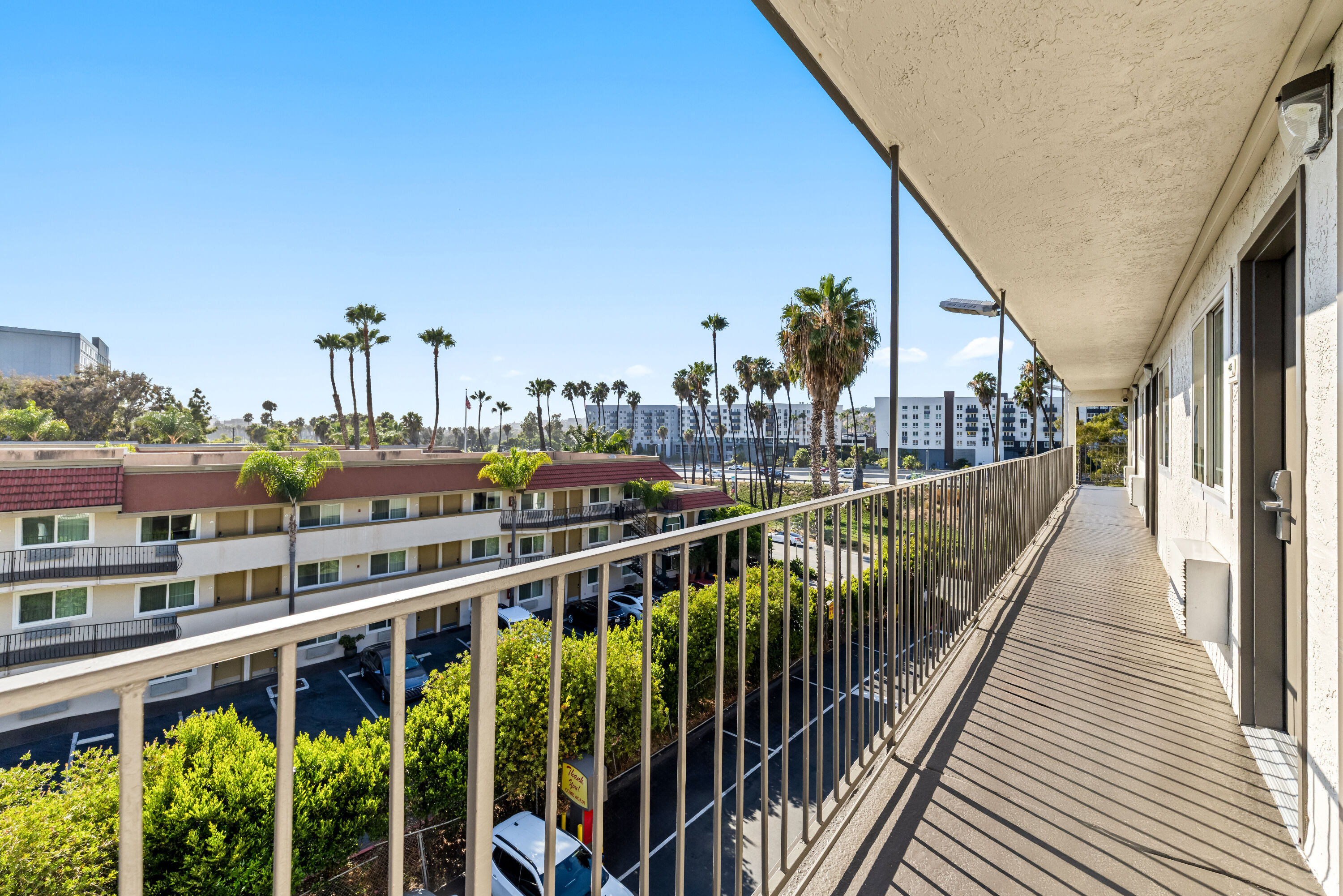 Guest room patio at the Super 8 by Wyndham San Diego Hotel Circle in San Diego, California