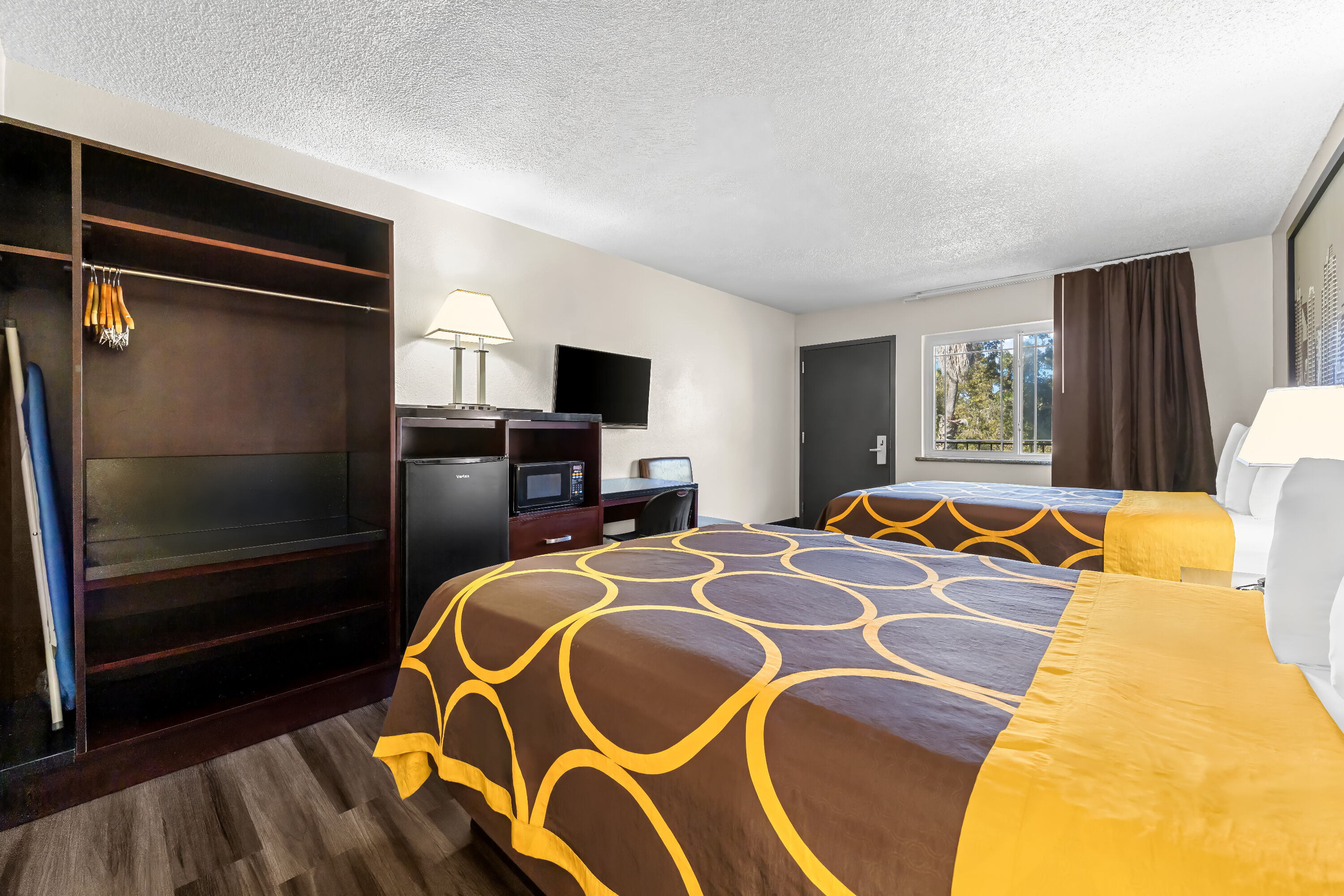 Double bed guest room at the Super 8 by Wyndham San Diego Hotel Circle in San Diego, California