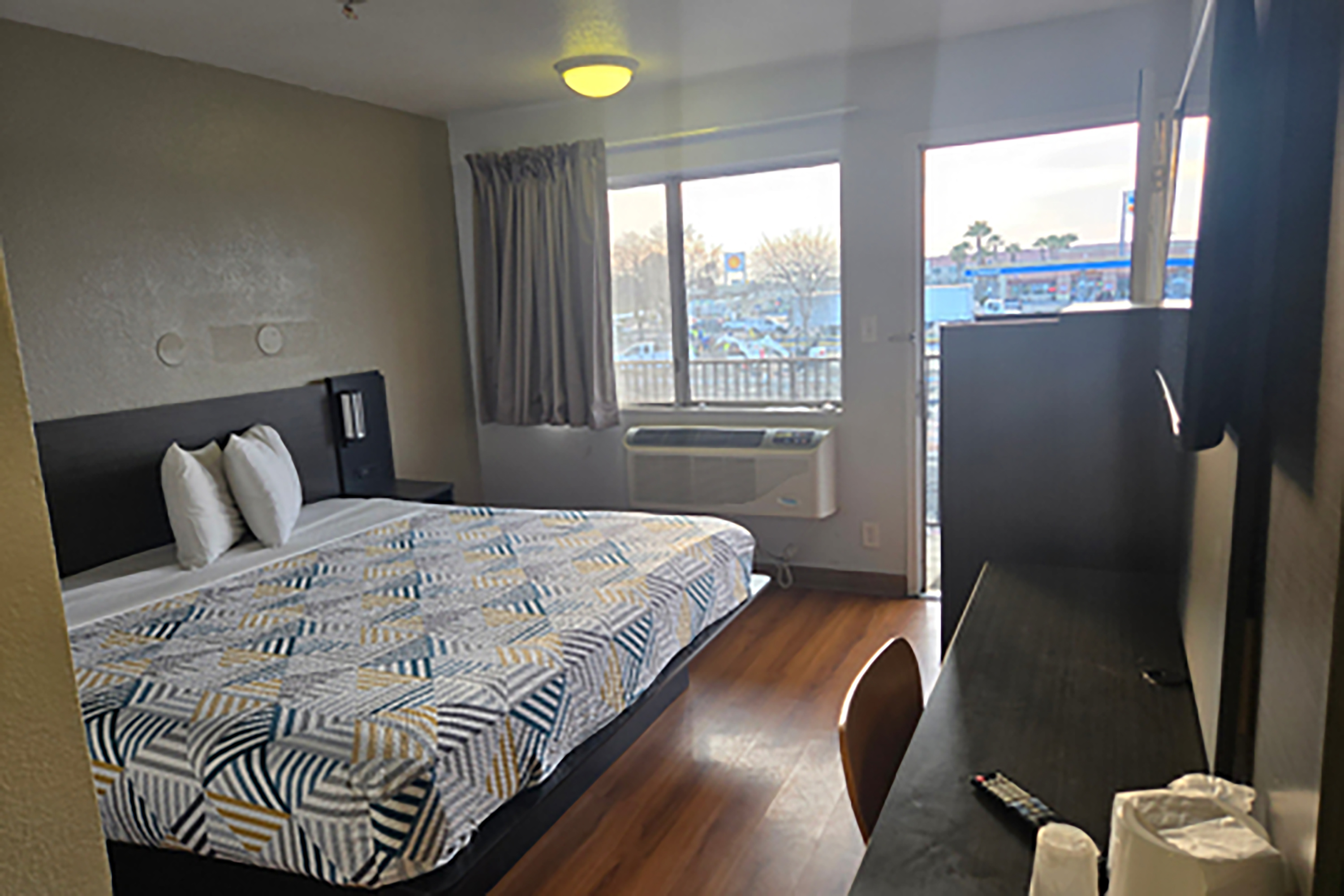 Guest room at the Super 8 by Wyndham Tracy in Tracy, California