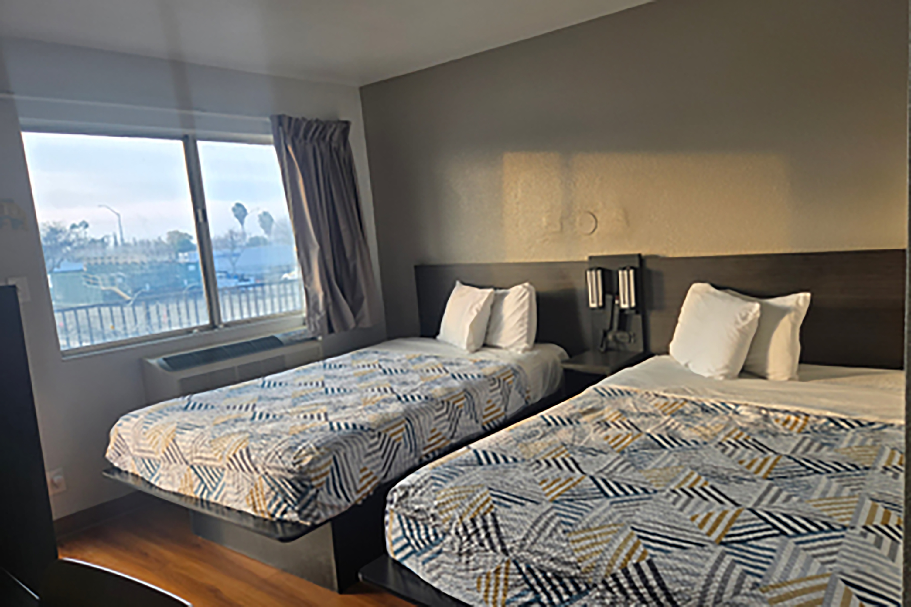 Guest room at the Super 8 by Wyndham Tracy in Tracy, California