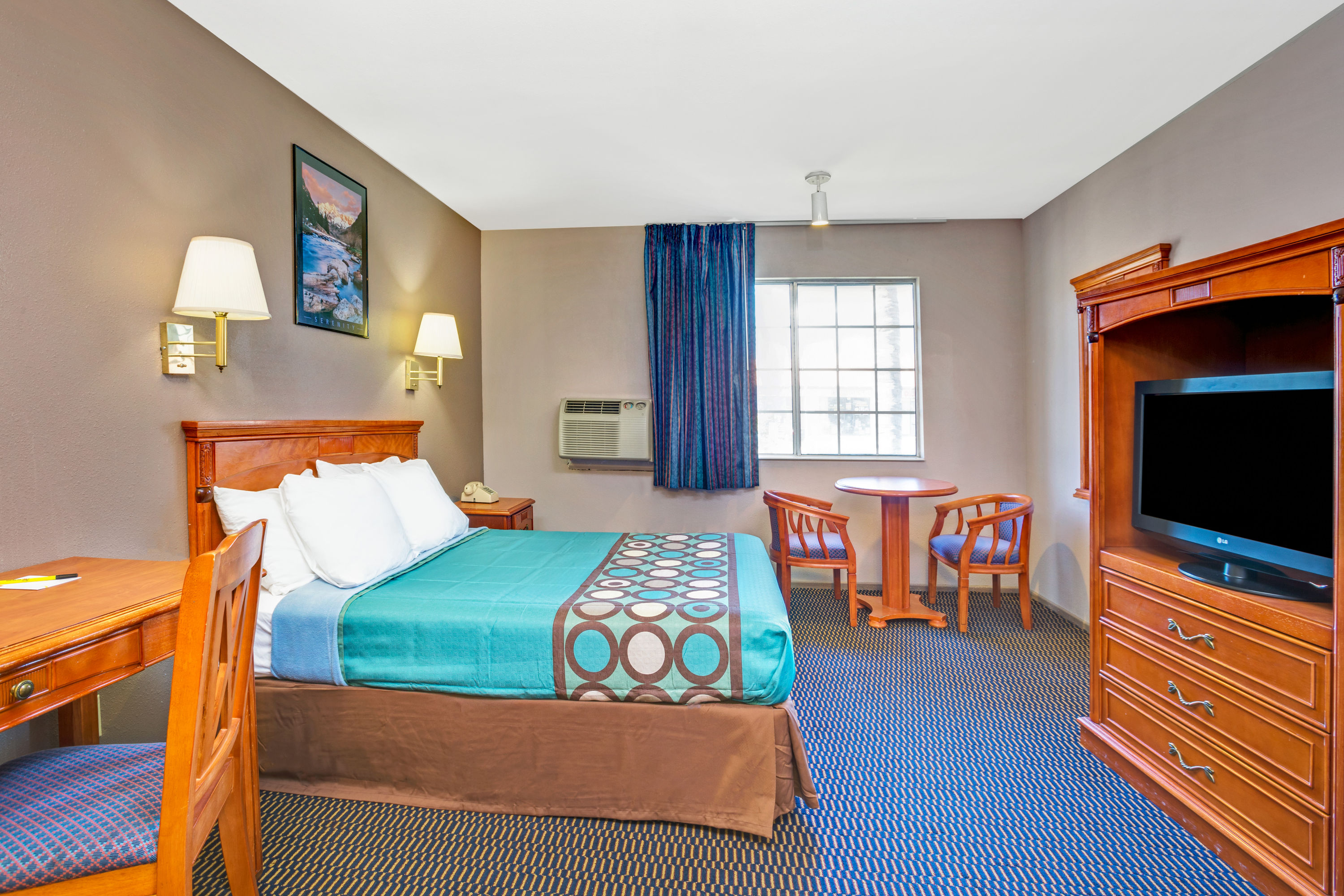 Guest room at the Super 8 by Wyndham Upland Ontario CA in Upland, California