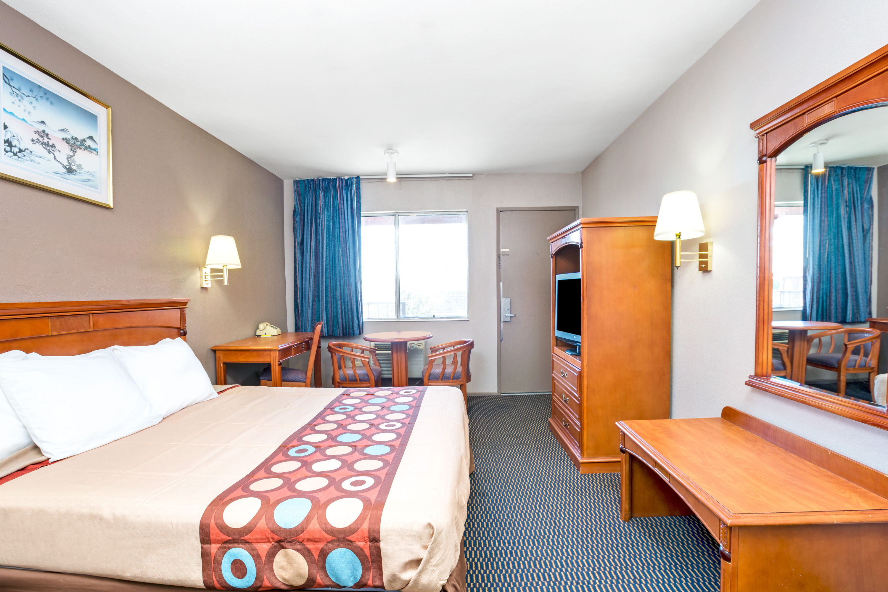 Guest room at the Super 8 by Wyndham Upland Ontario CA in Upland, California