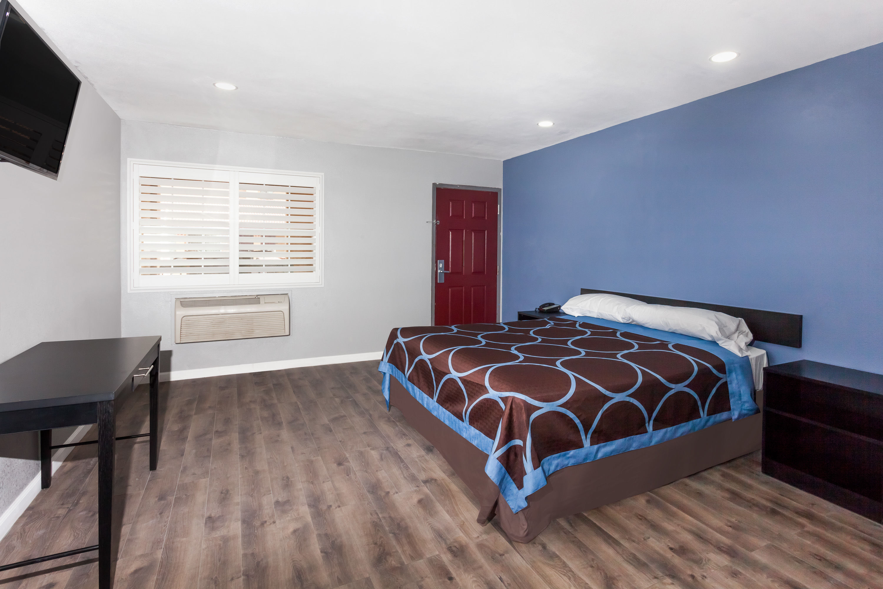 Guest room at the Super 8 by Wyndham Visalia in Visalia, California