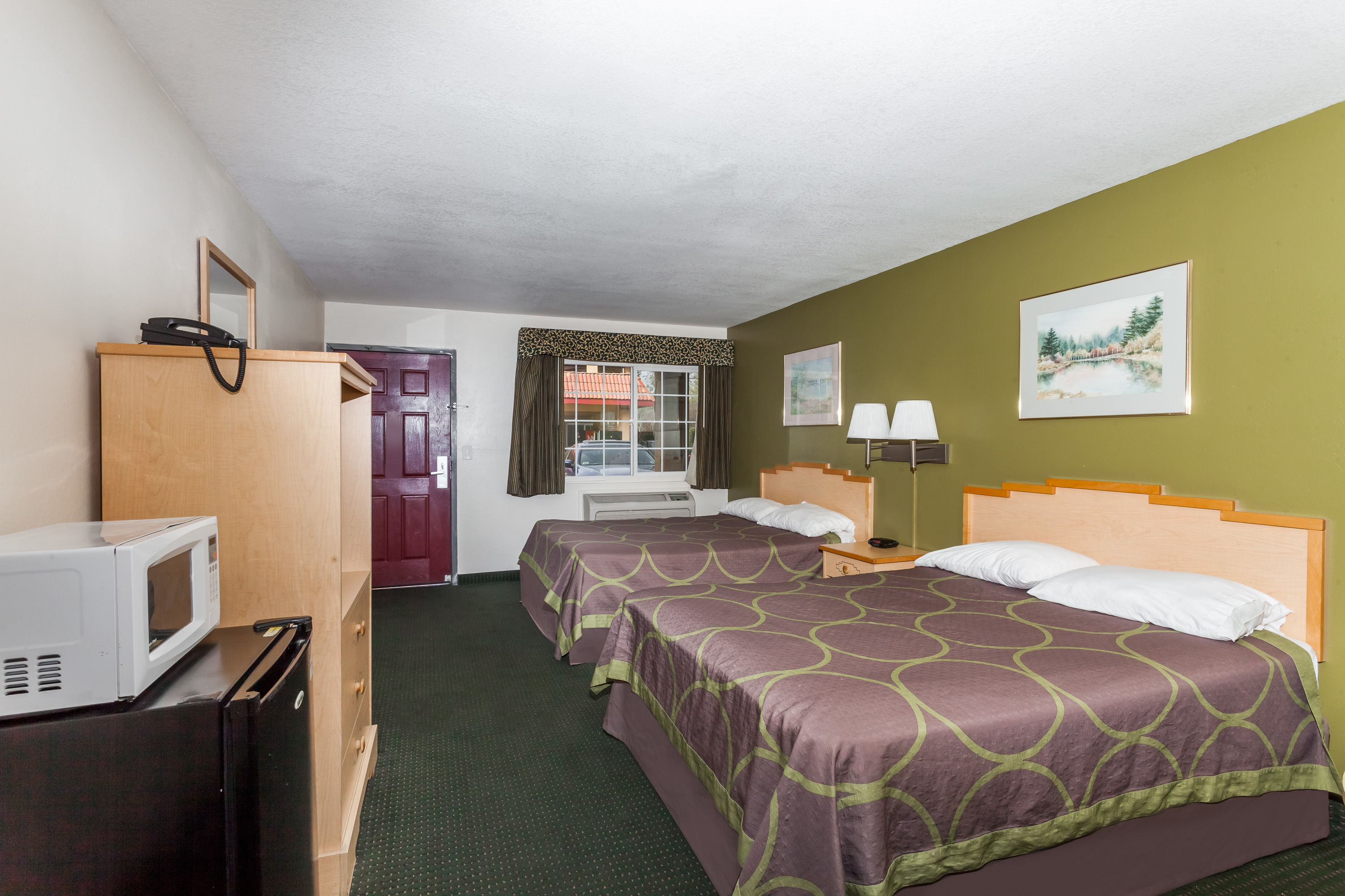 Guest room at the Super 8 by Wyndham Visalia in Visalia, California