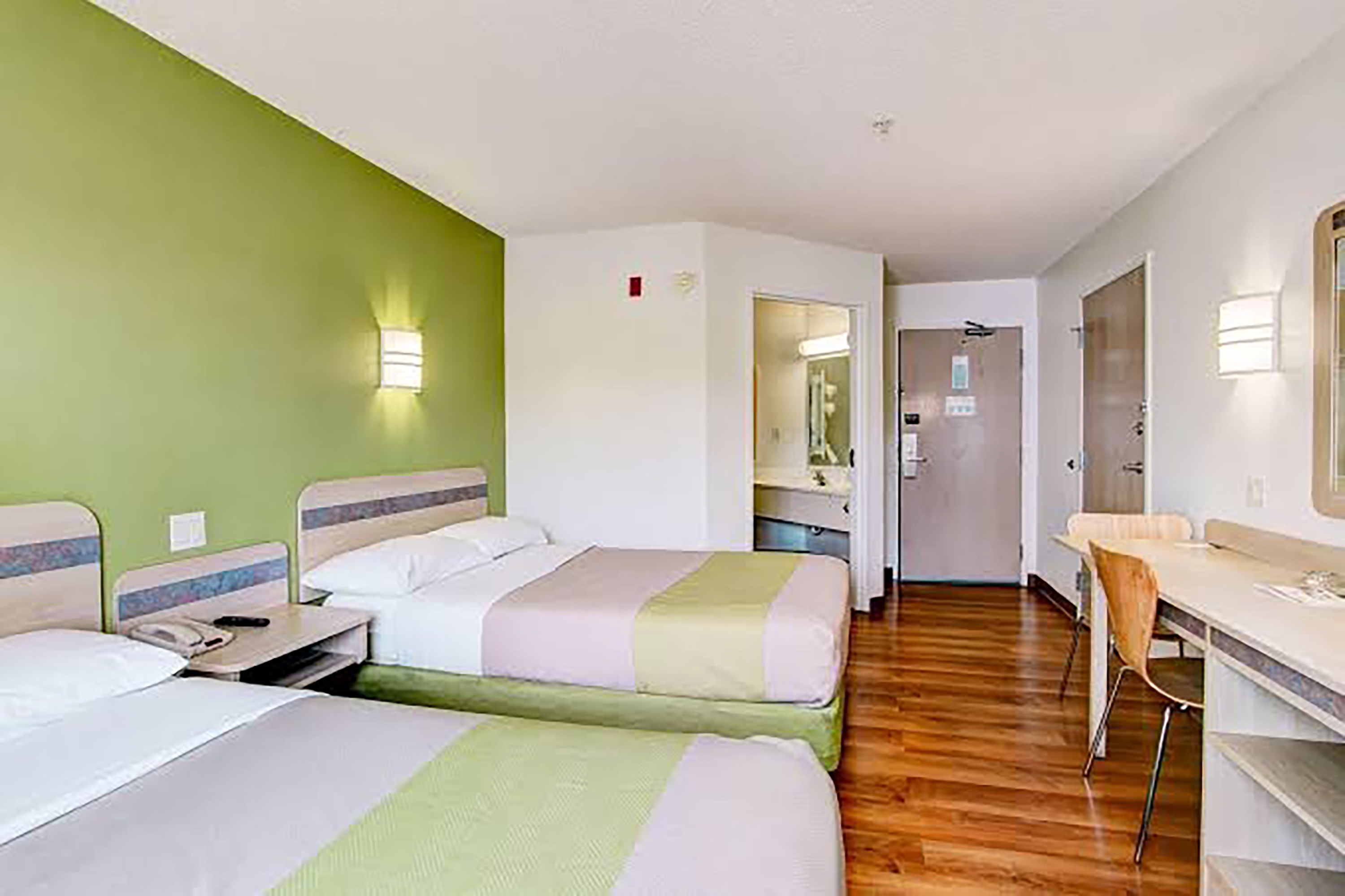 Guest room at the Super 8 by Wyndham Aurora East in Aurora, Colorado