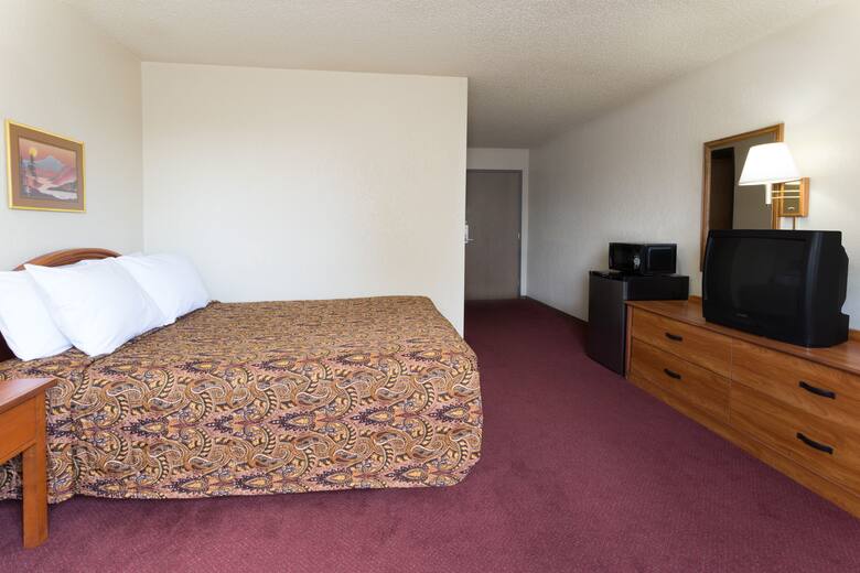 Guest room at the Super 8 Brighton in Brighton, Colorado
