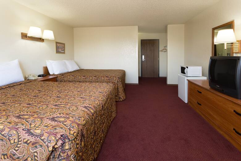 Guest room at the Super 8 Brighton in Brighton, Colorado