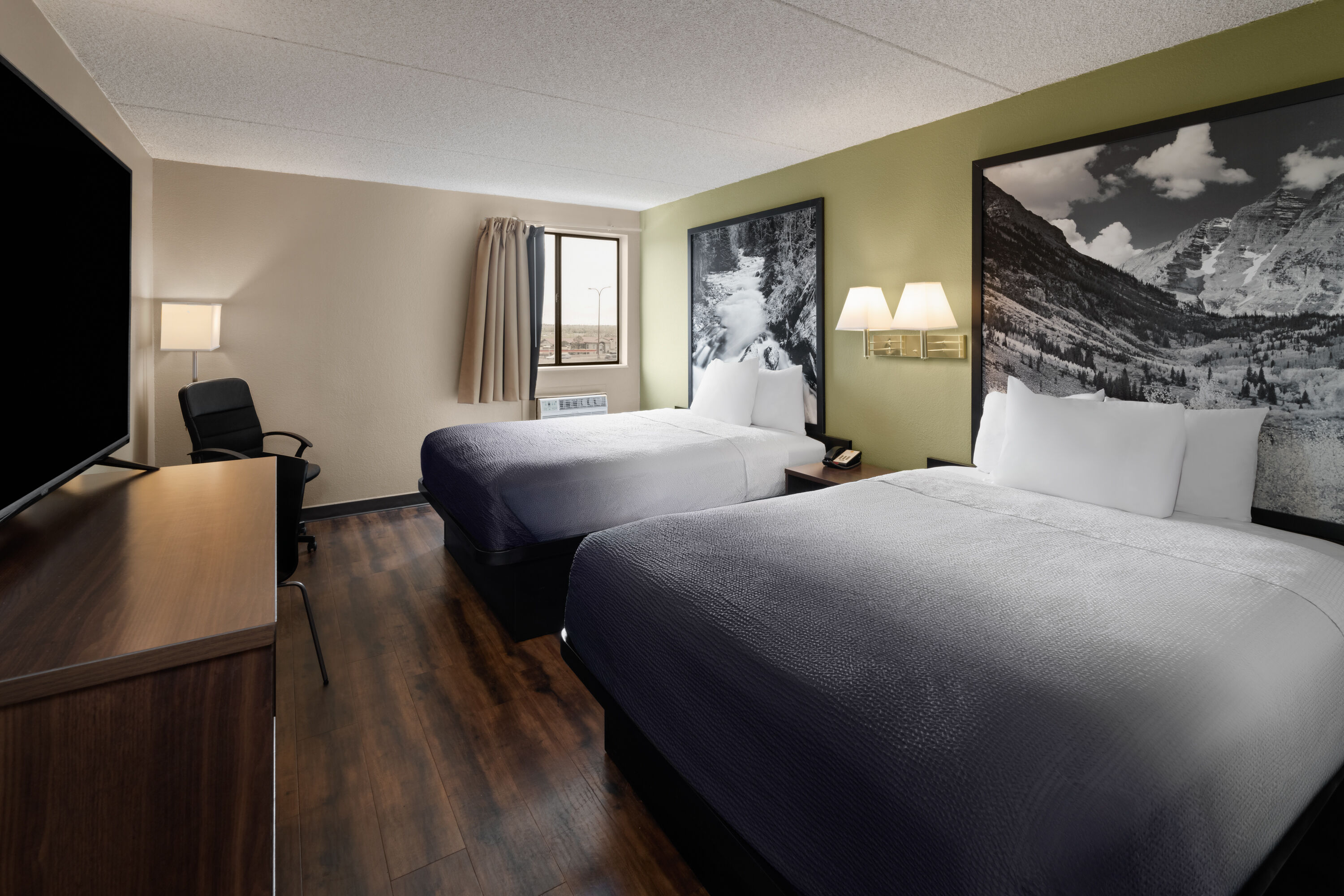 Guest room at the Super 8 by Wyndham Colo. Sprs. Garden Of The Gods in Colorado Springs, Colorado