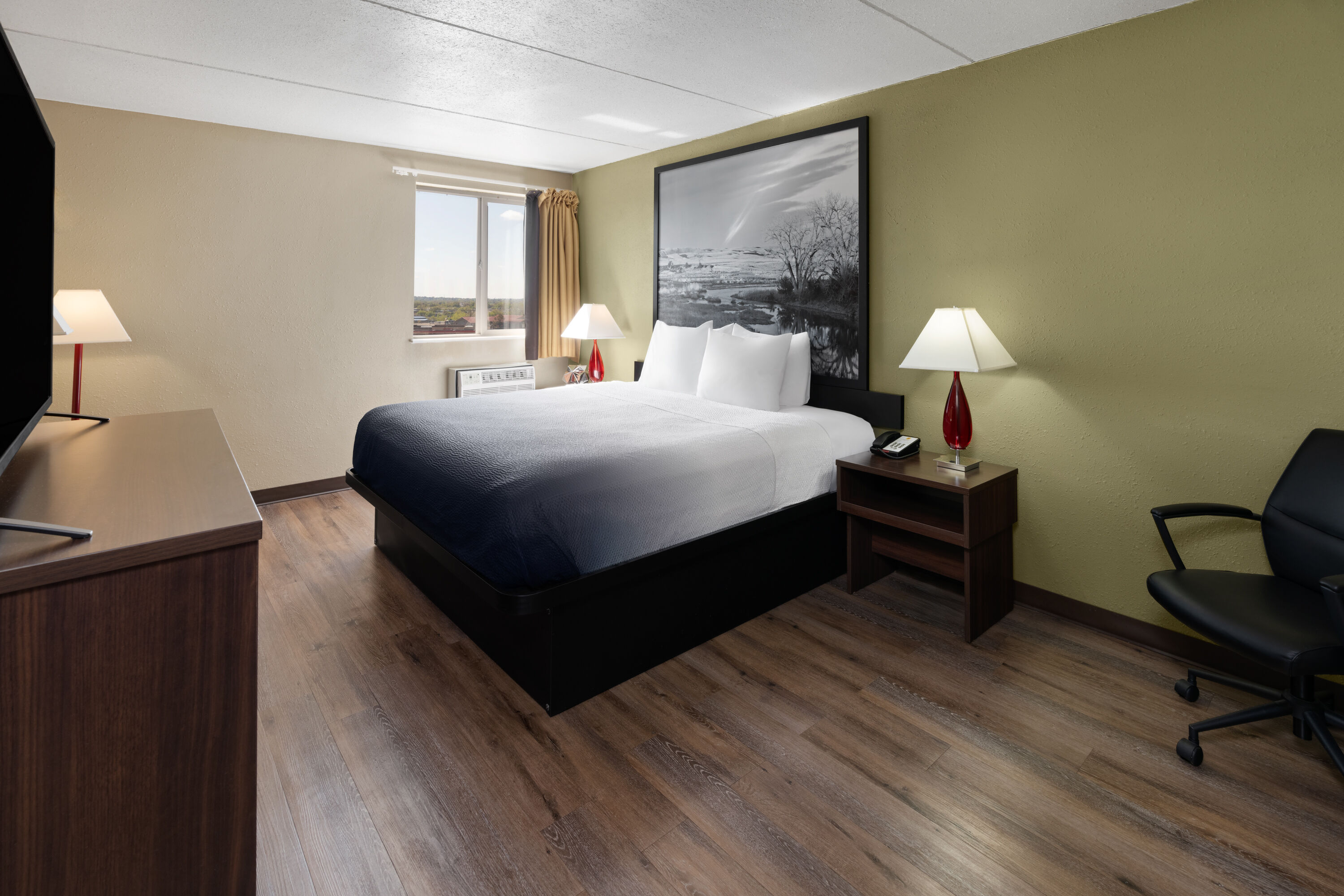 Guest room at the Super 8 by Wyndham Colo. Sprs. Garden Of The Gods in Colorado Springs, Colorado
