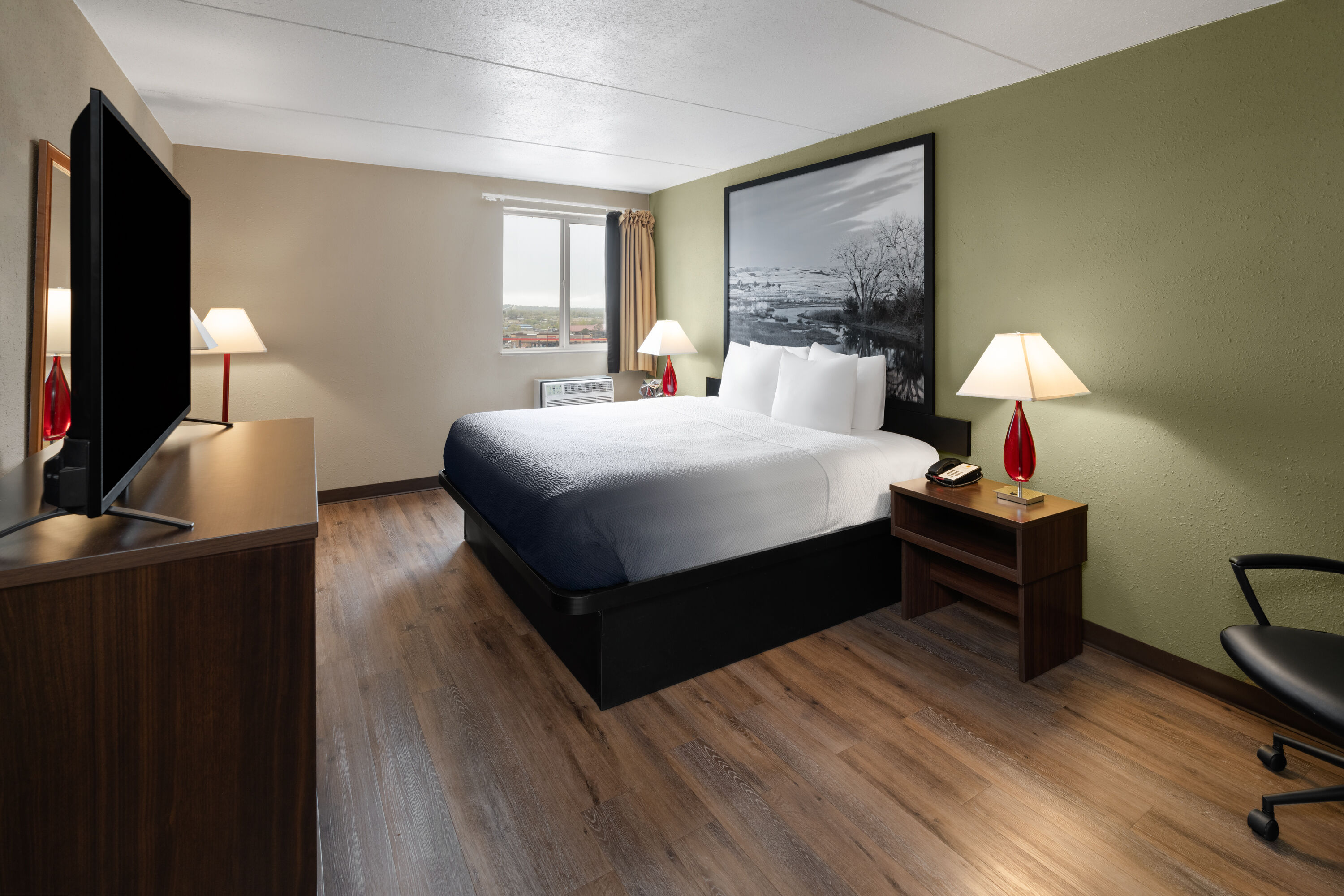 Guest room at the Super 8 by Wyndham Colo. Sprs. Garden Of The Gods in Colorado Springs, Colorado