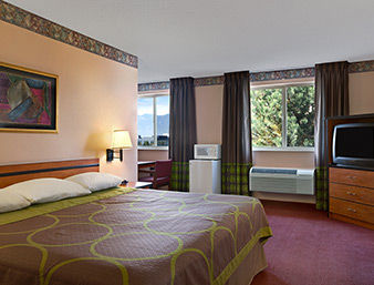 Guest room at the Super 8 by Wyndham Colorado Springs Airport in Colorado Springs, Colorado