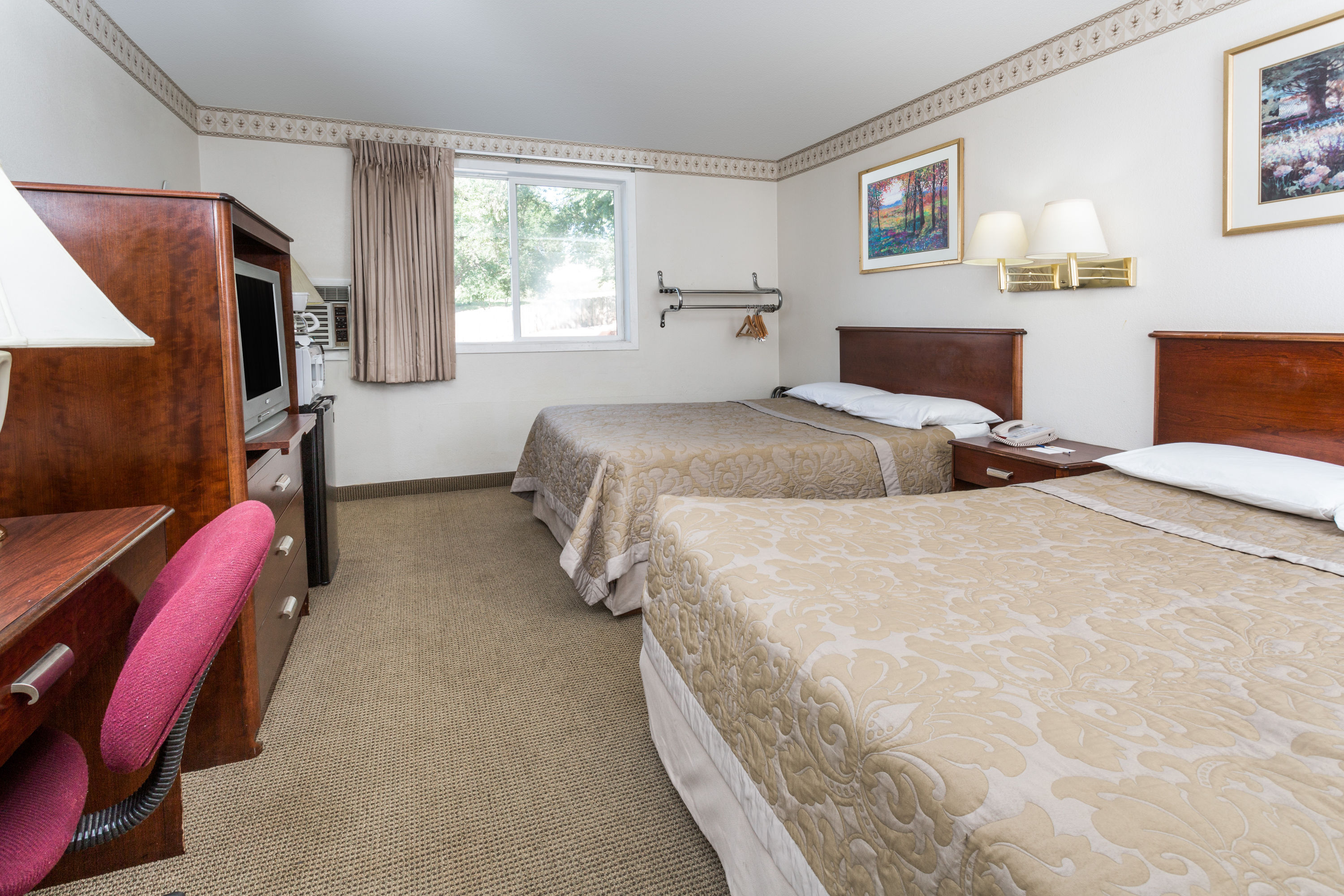 Guest room at the Super 8 by Wyndham Colorado Springs/Chestnut Street in Colorado Springs, Colorado