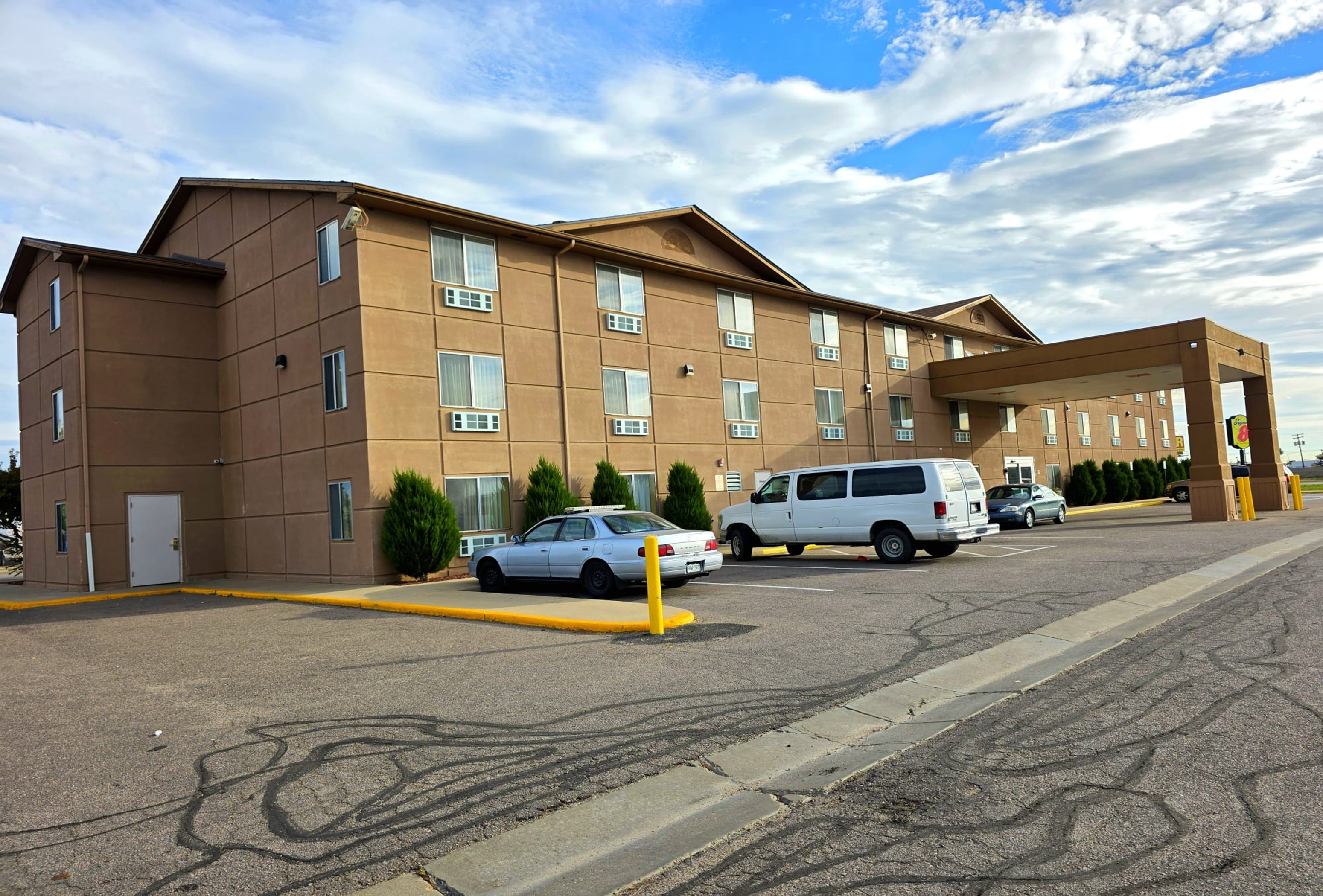 Exterior of Super 8 by Wyndham Henderson North East Denver hotel in Henderson, Colorado
