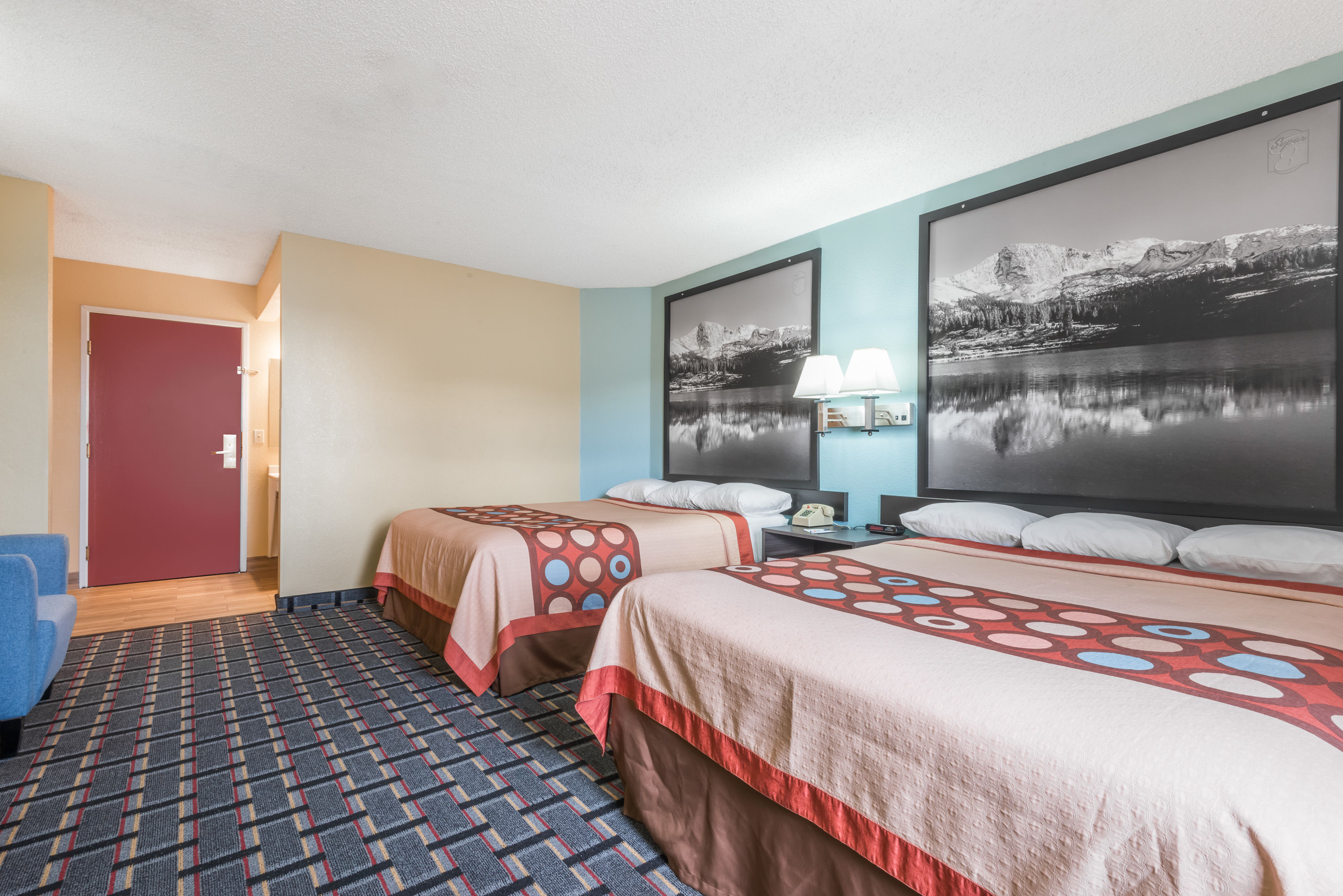Guest room at the Super 8 by Wyndham Henderson North East Denver in Henderson, Colorado