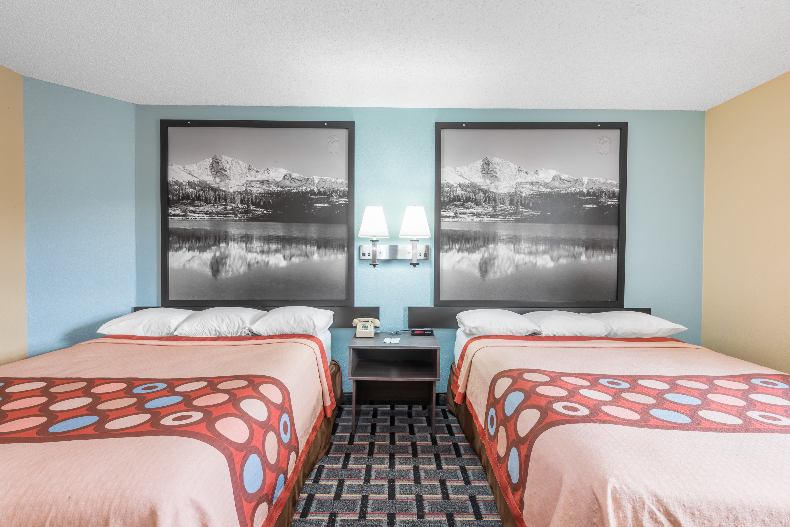 Guest room at the Super 8 by Wyndham Henderson North East Denver in Henderson, Colorado