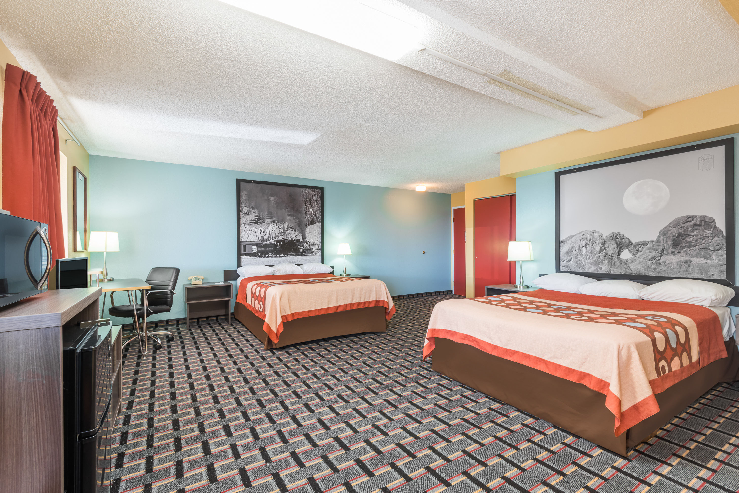 Guest room at the Super 8 by Wyndham Henderson North East Denver in Henderson, Colorado