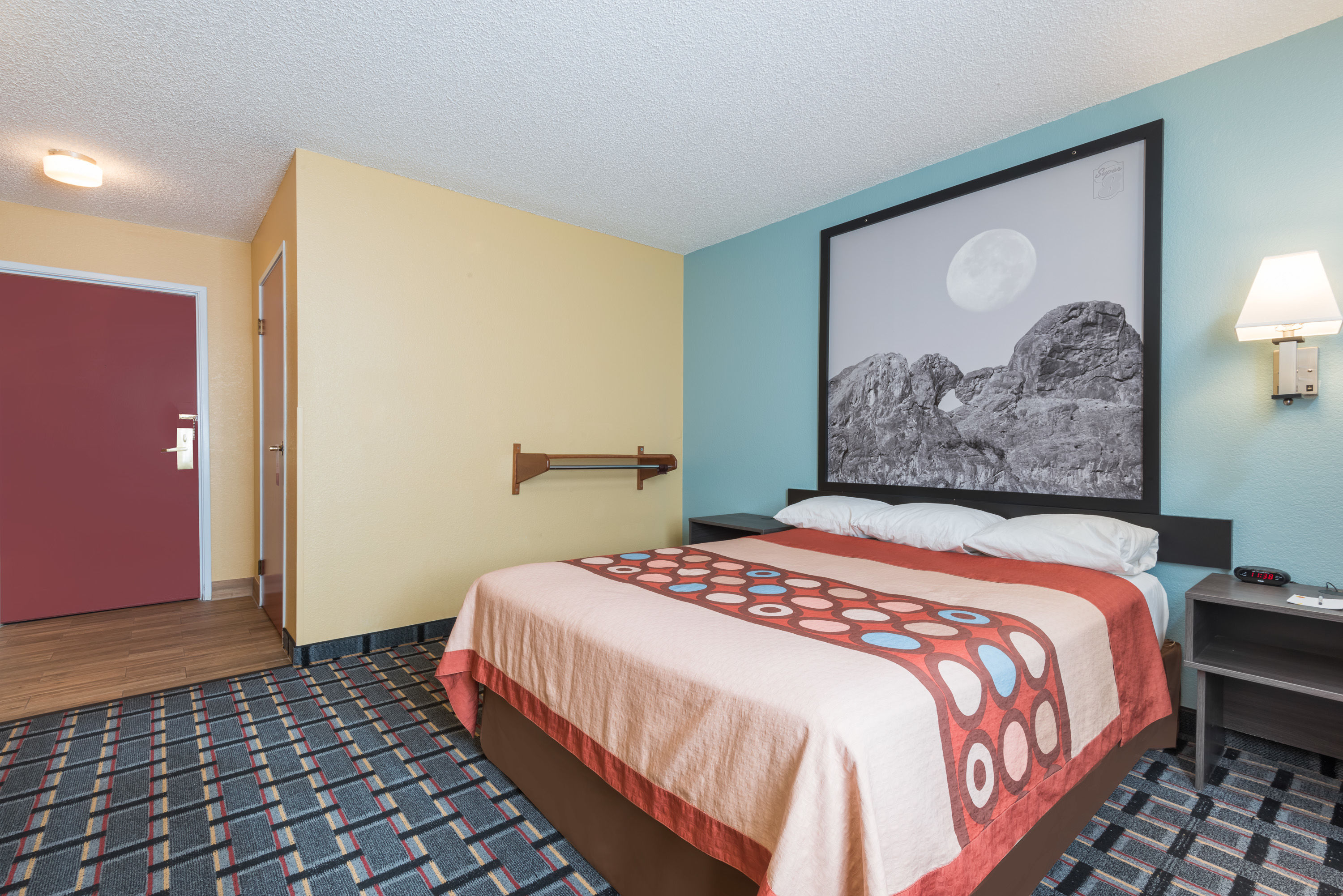 Guest room at the Super 8 by Wyndham Henderson North East Denver in Henderson, Colorado