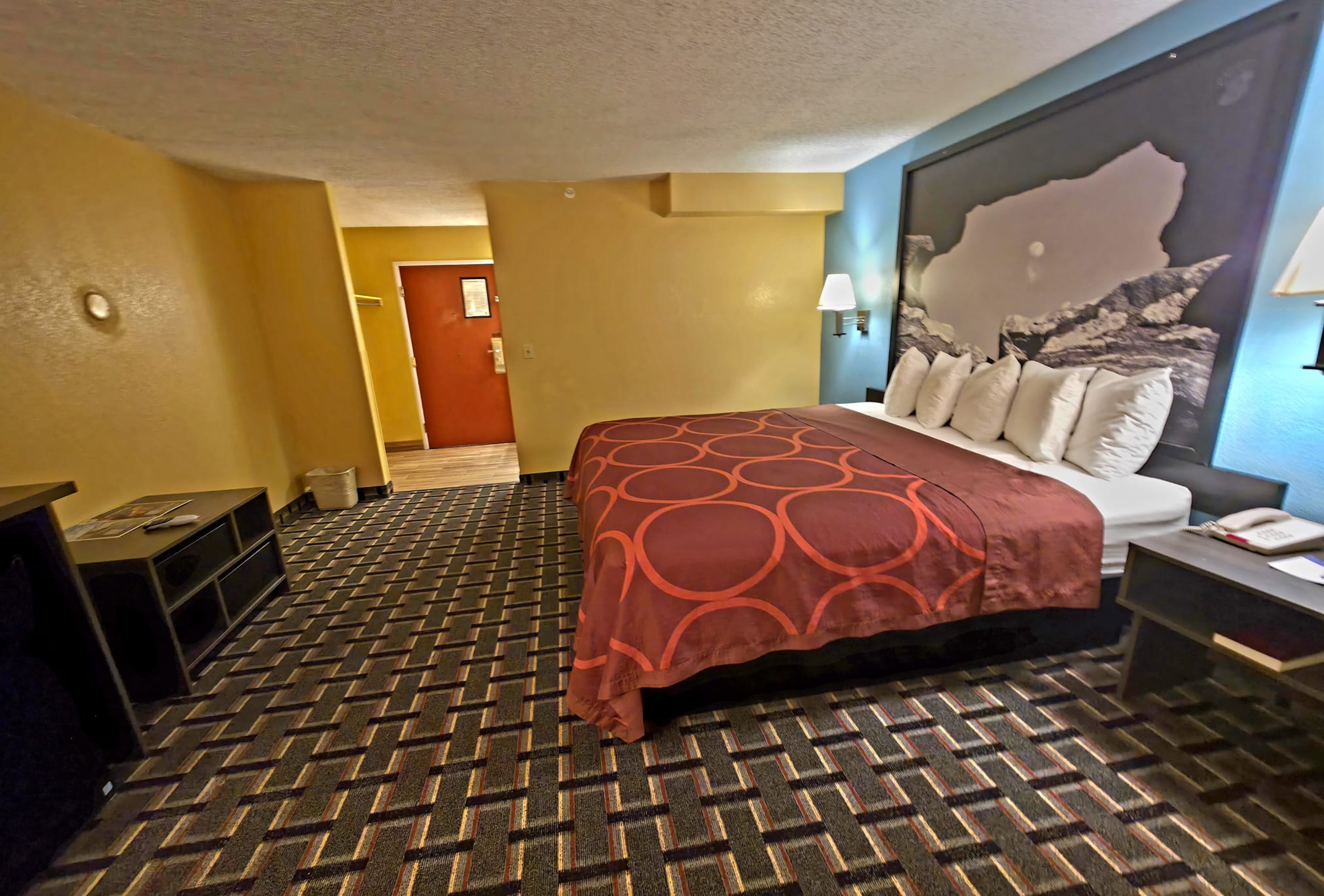 Guest room at the Super 8 by Wyndham Henderson North East Denver in Henderson, Colorado