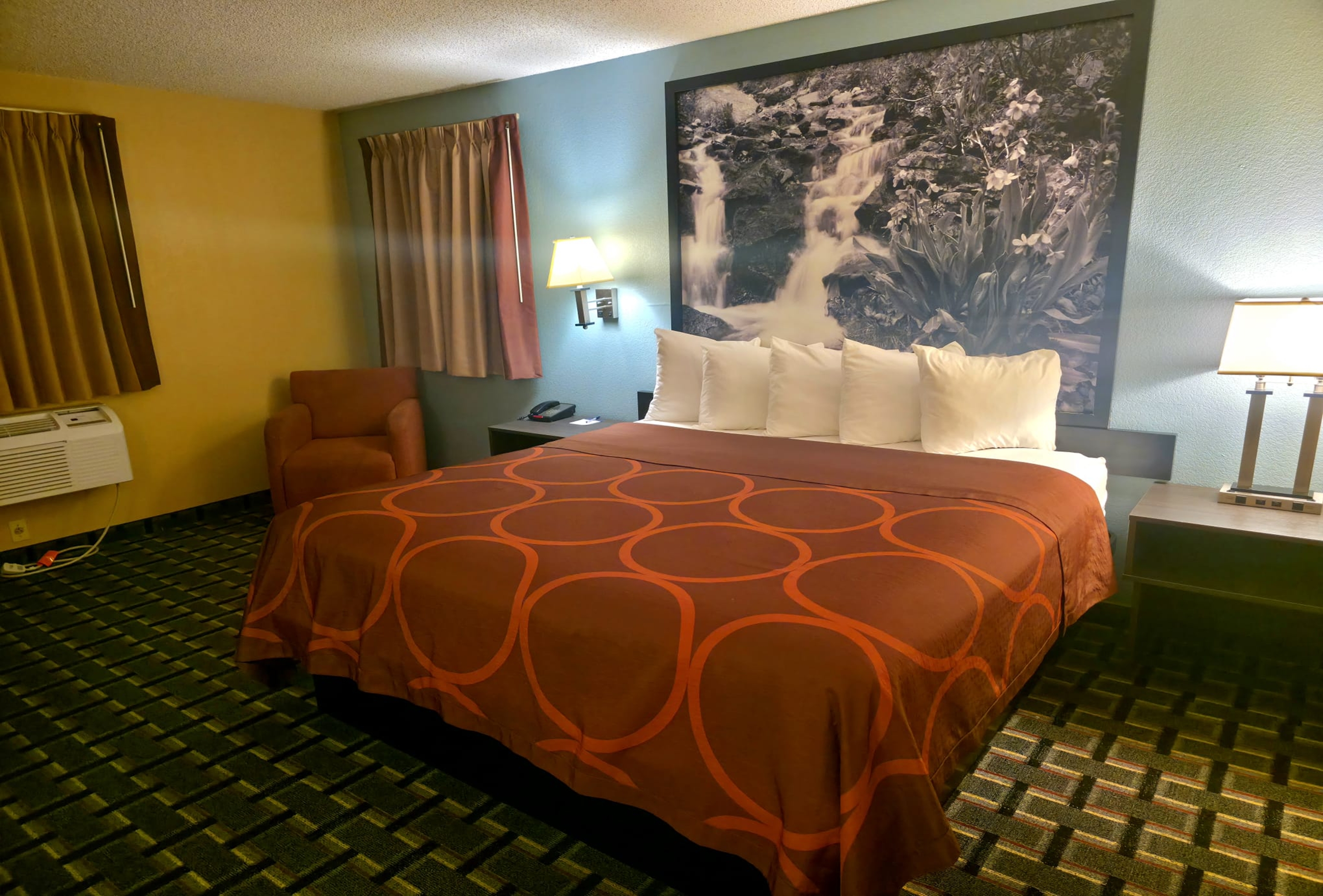Guest room at the Super 8 by Wyndham Henderson North East Denver in Henderson, Colorado