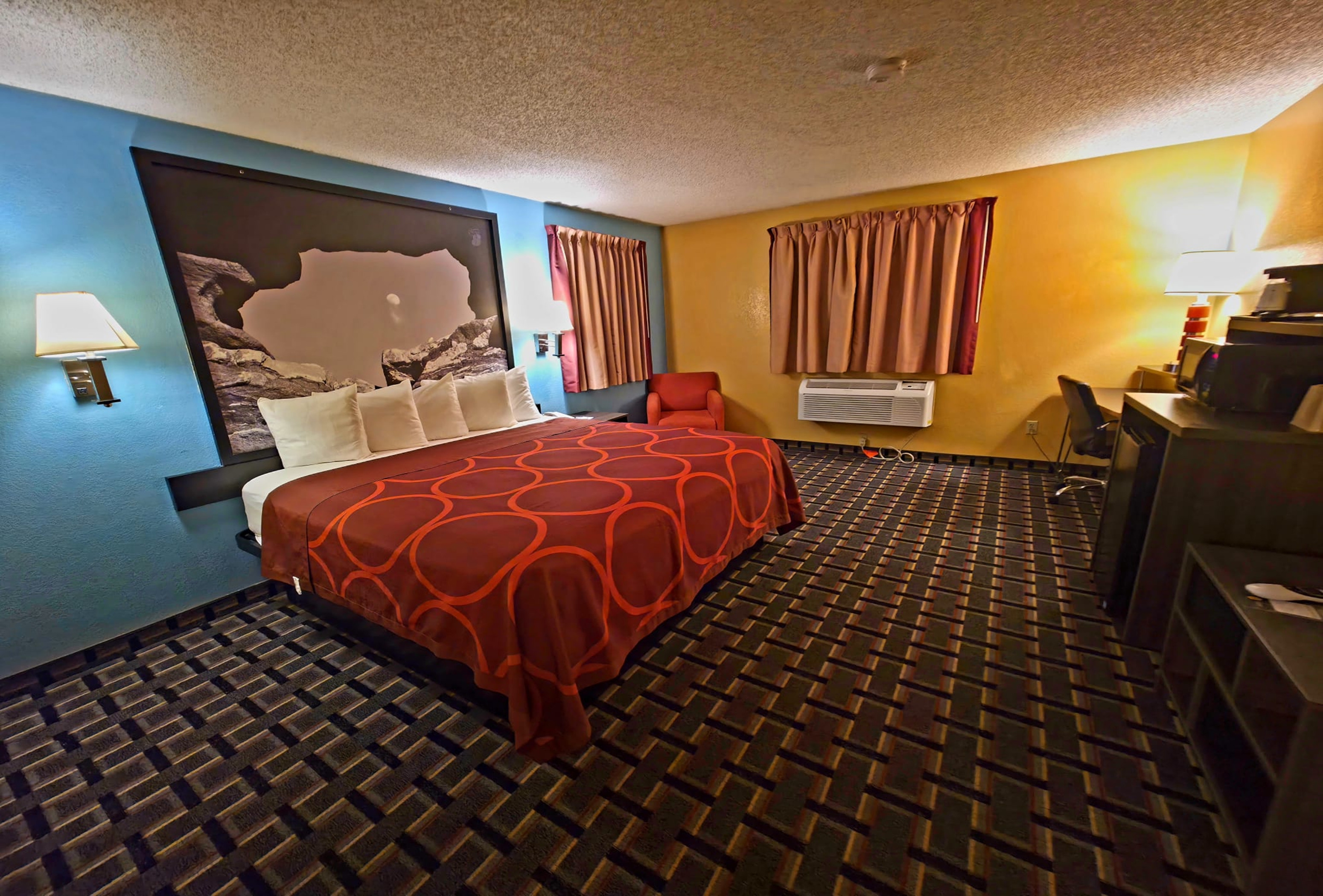 Guest room at the Super 8 by Wyndham Henderson North East Denver in Henderson, Colorado