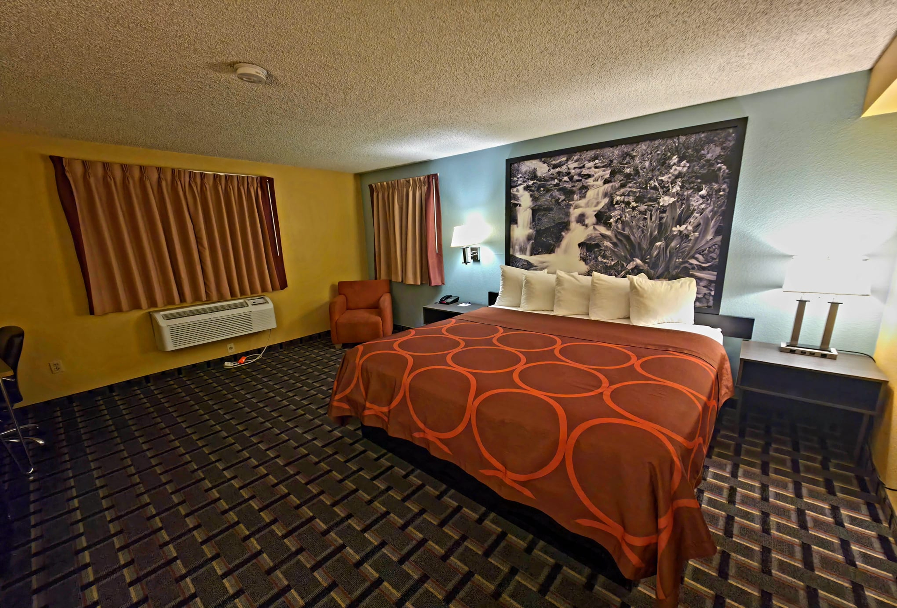 Guest room at the Super 8 by Wyndham Henderson North East Denver in Henderson, Colorado