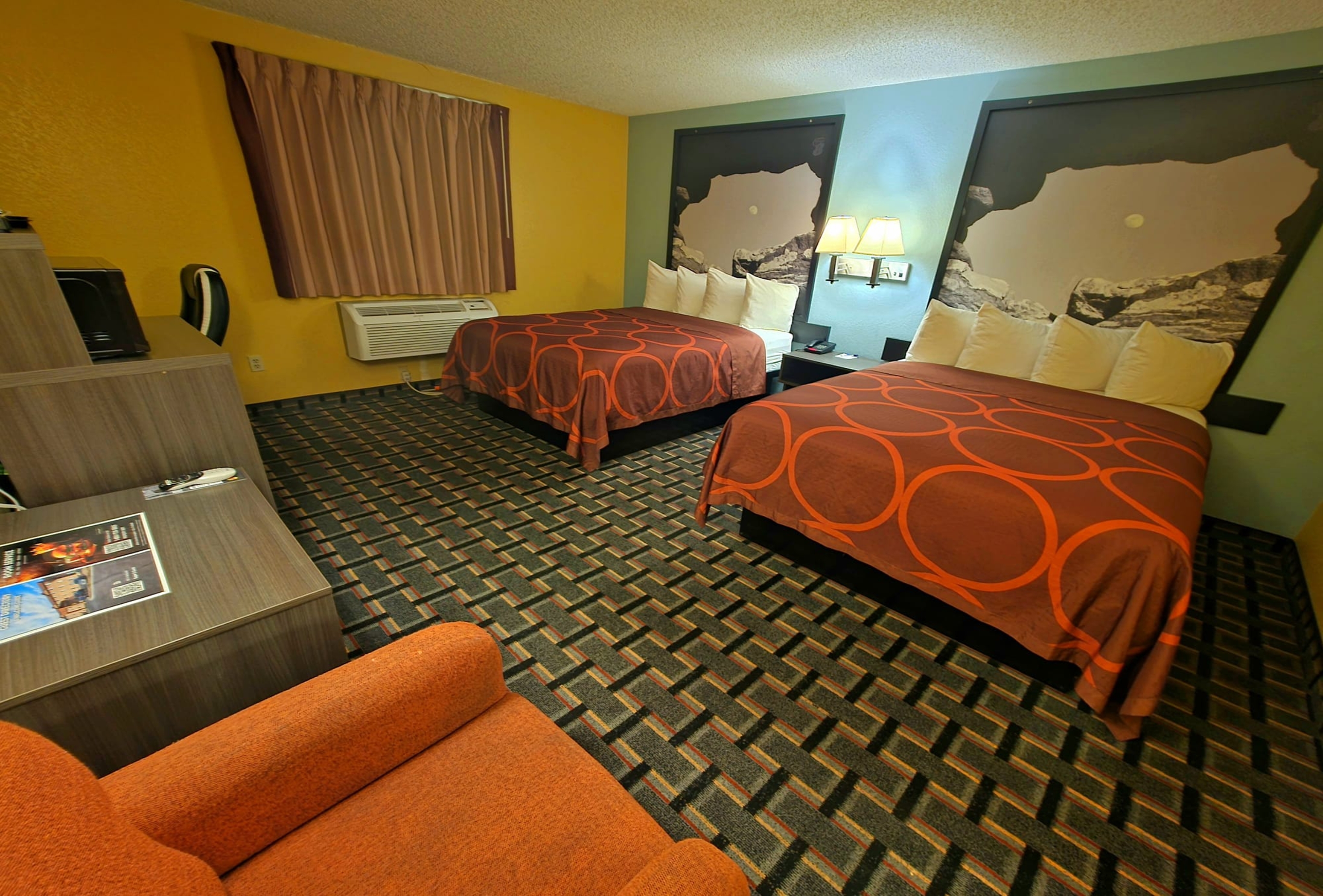 Guest room at the Super 8 by Wyndham Henderson North East Denver in Henderson, Colorado