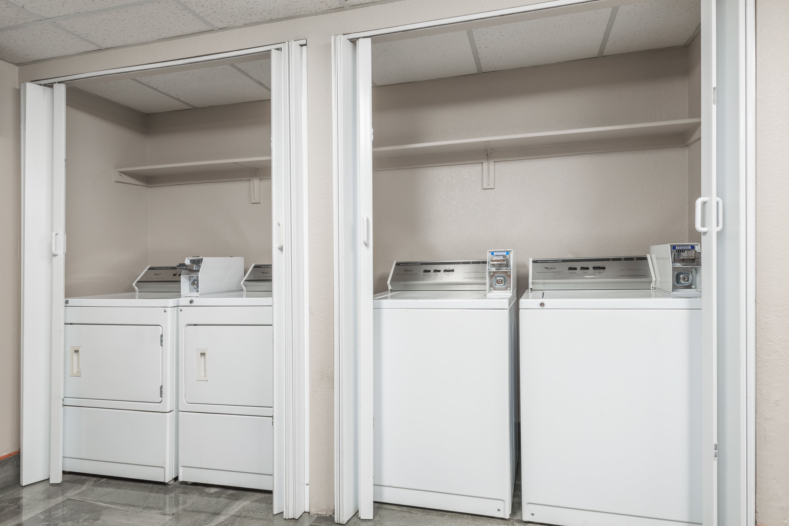 Laundry facilities at Super 8 by Wyndham Henderson North East Denver in Henderson, Colorado