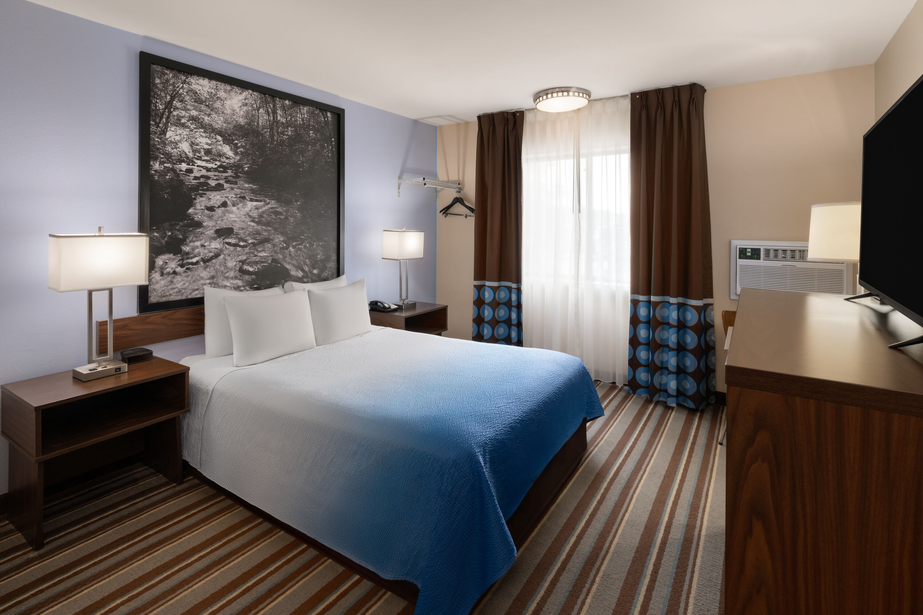Guest room at the Super 8 by Wyndham Longmont/Twin Peaks in Longmont, Colorado