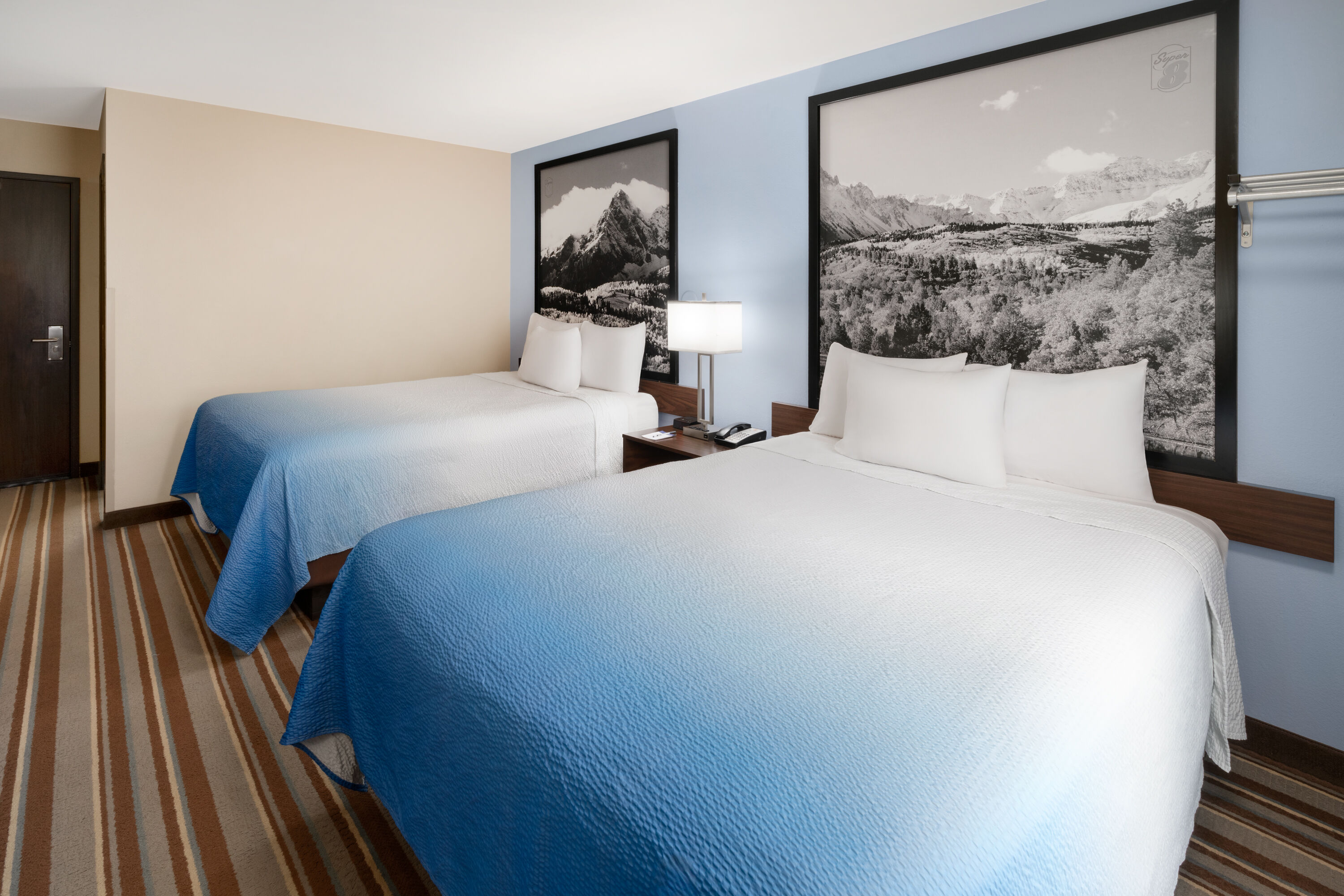 Guest room at the Super 8 by Wyndham Longmont/Twin Peaks in Longmont, Colorado